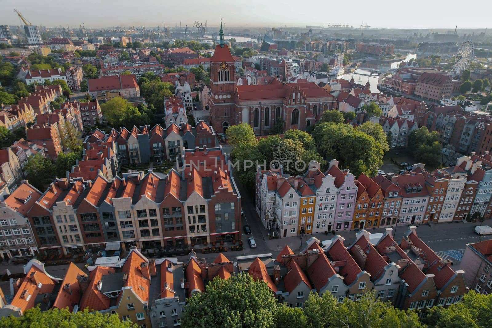Beautiful panoramic architecture of old town in Gdansk, Poland at sunrise. Aerial view drone pov. Landscape cityscape City from Above. Small vintage historical buildings Europe Tourist Attractions travel destination by anna_stasiia