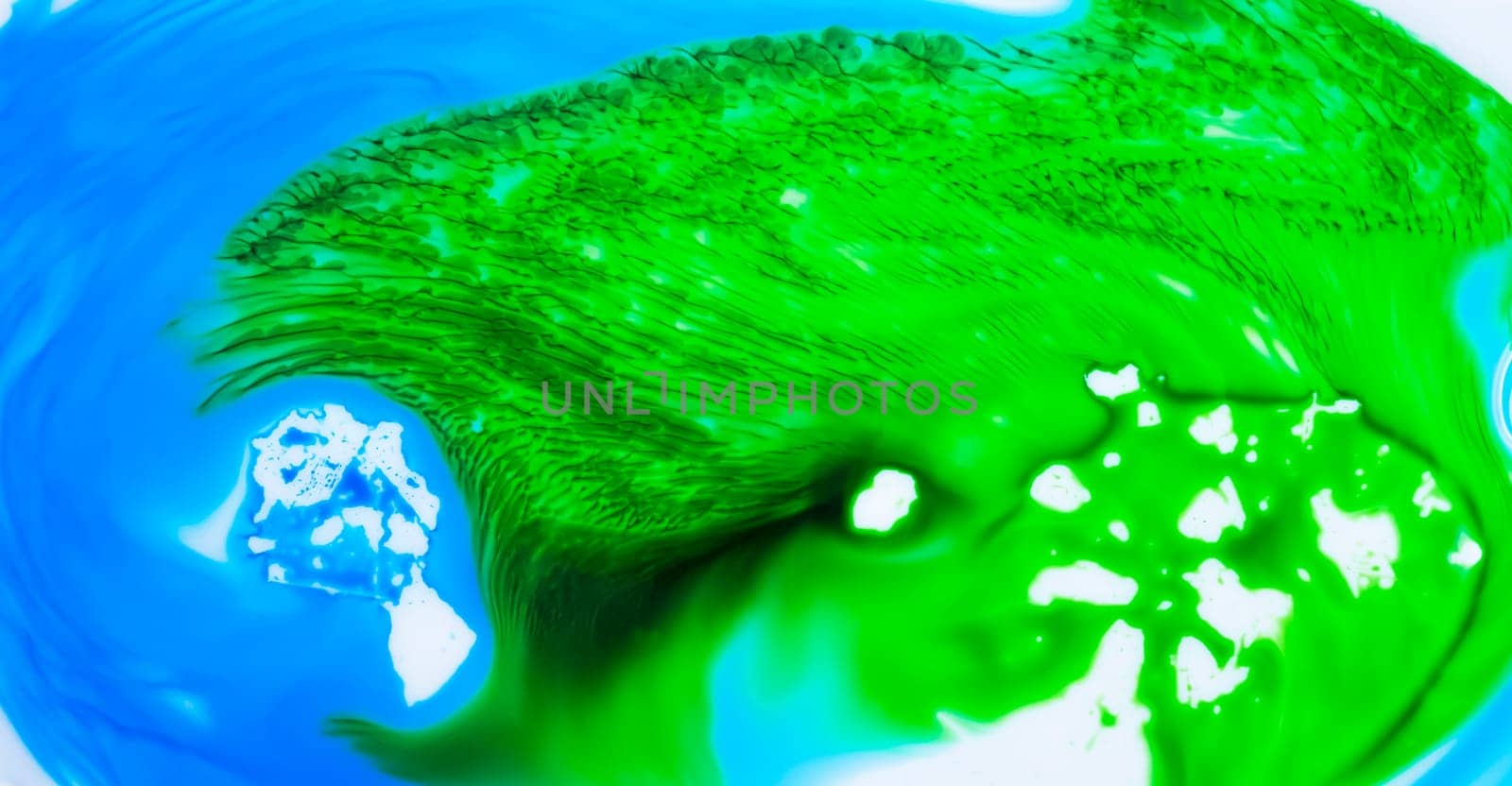 blue and green paint background. Beautiful abstraction of liquid paints by jackreznor
