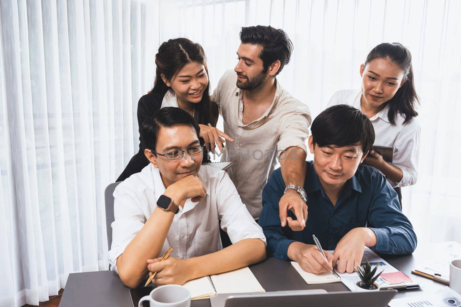 Group of diverse office worker employee working together on strategic business marketing planning in corporate office room. Positive teamwork in business workplace concept. Prudent