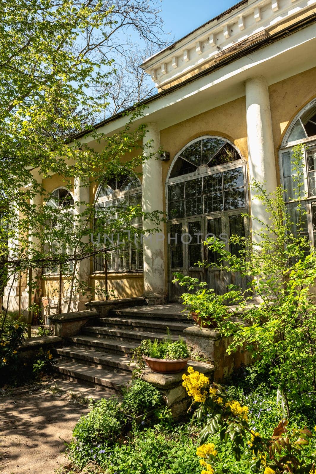 Old historical building in Odessa Botanical Garden in Ukraine by Multipedia