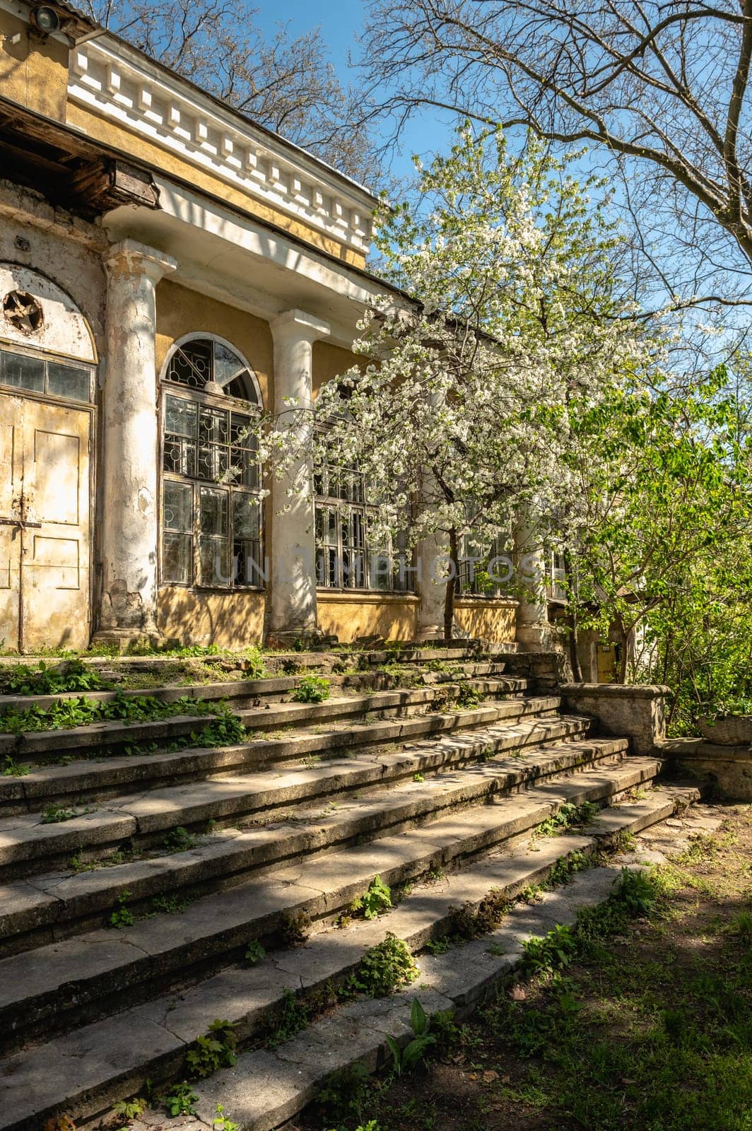 Odessa, Ukraine, 16.04.2024. Old historical building in Odessa Botanical Garden in Ukraine on a sunny spring day