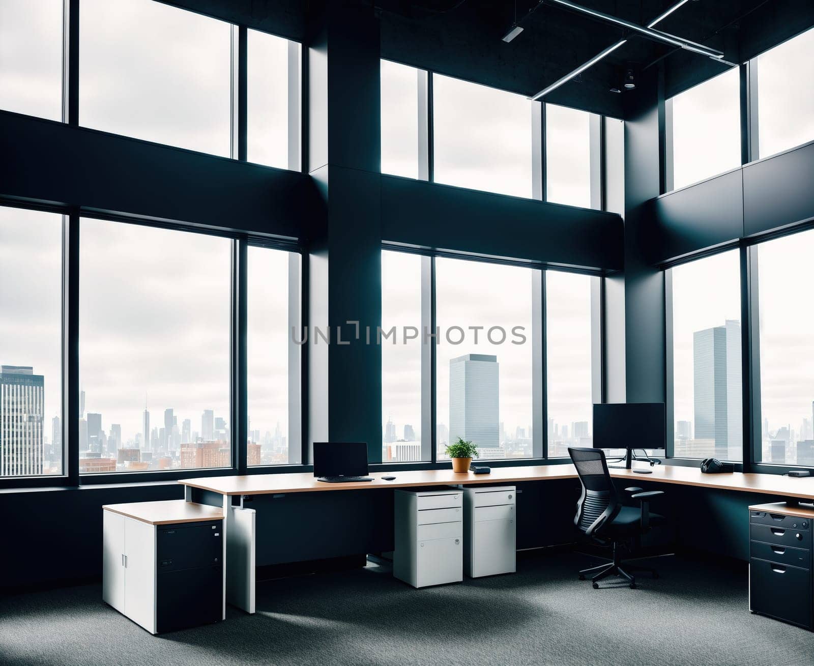 The image shows a modern office with large windows overlooking a city skyline.