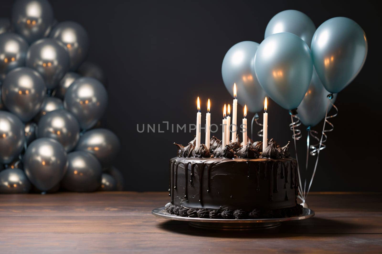 Birthday cake with burning candles and balloons on wooden table against blurred background by ThemesS