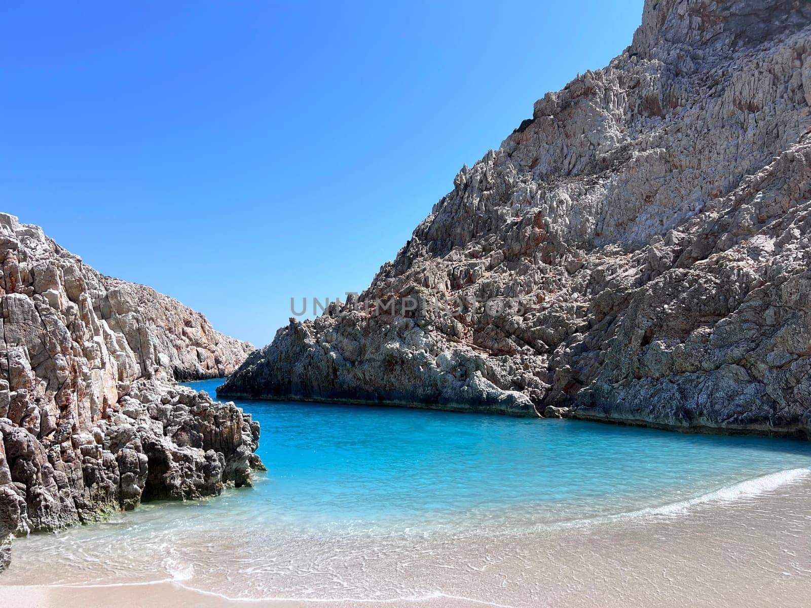 Seitan Limania beach in Crete no people sunny day blue water by padgurskas