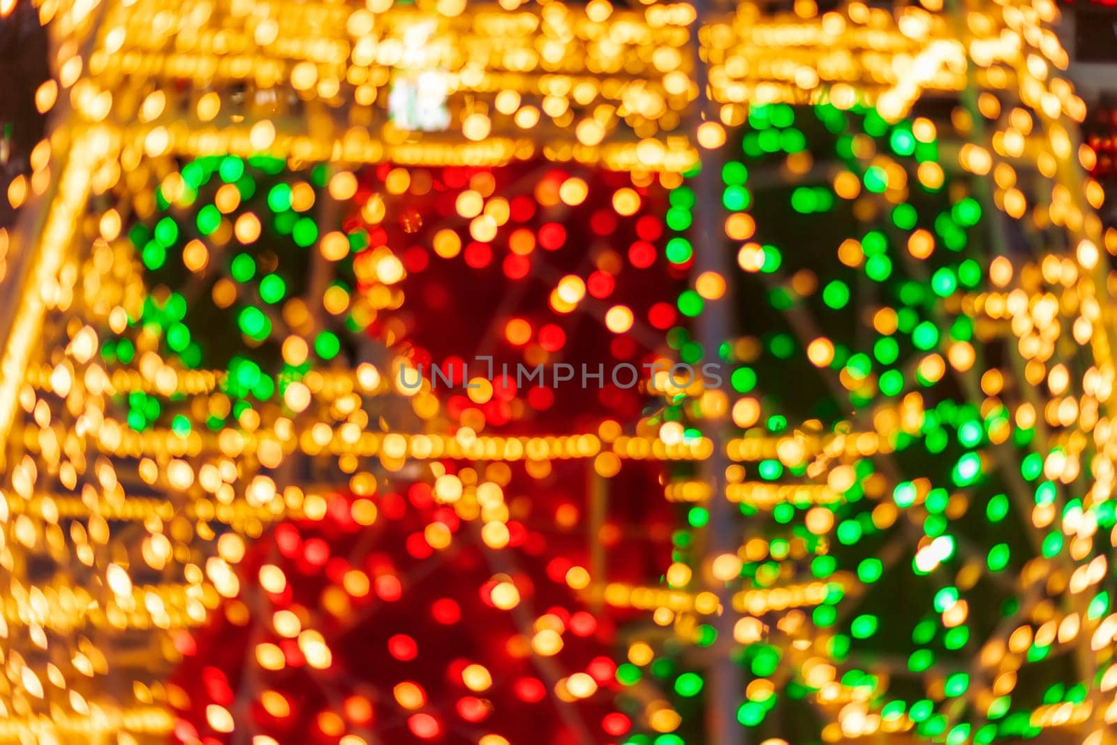 Festive background in different tones. Defocused bokeh lights.  by EdVal