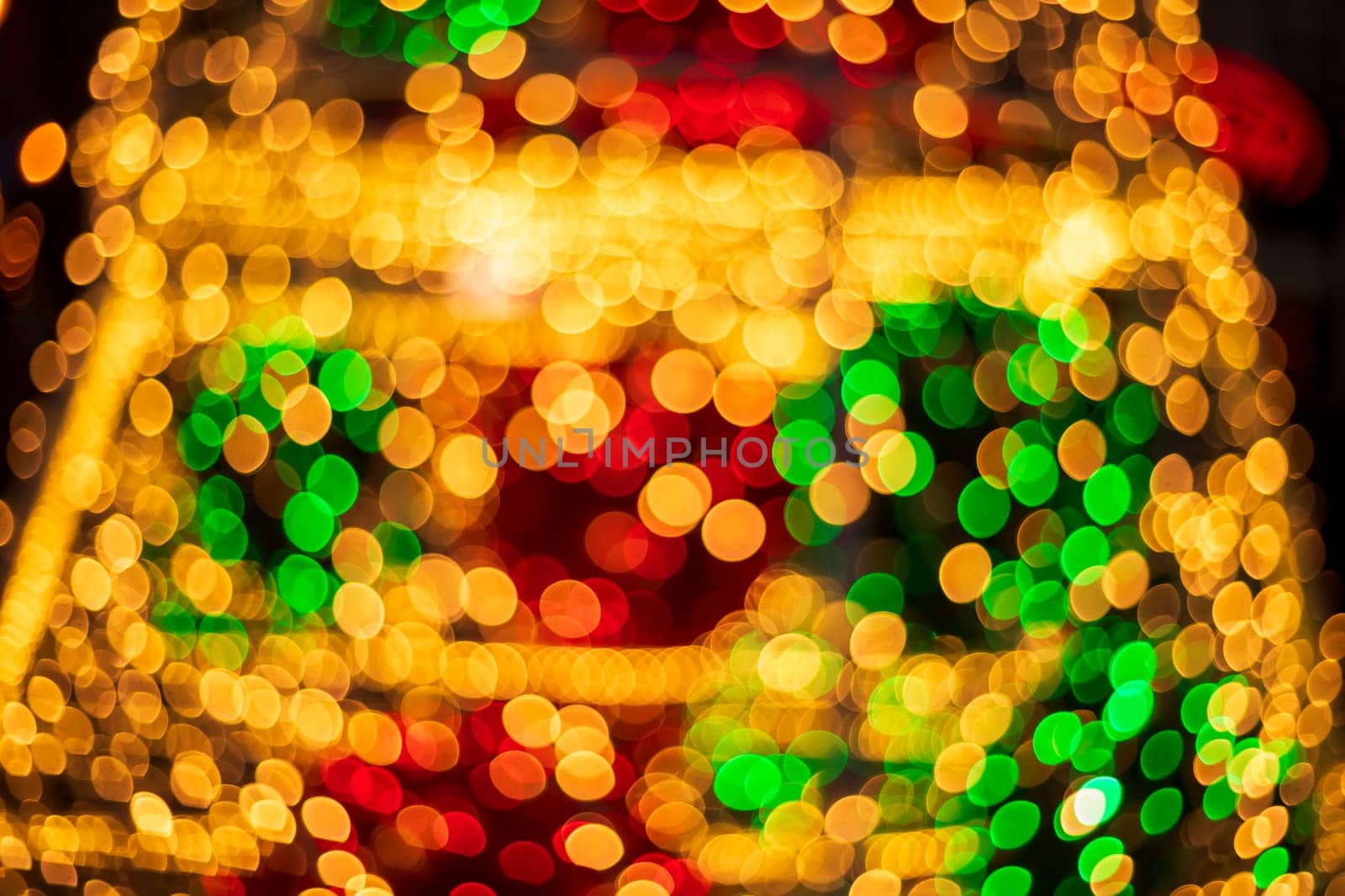 Festive background in different tones. Defocused bokeh lights. 