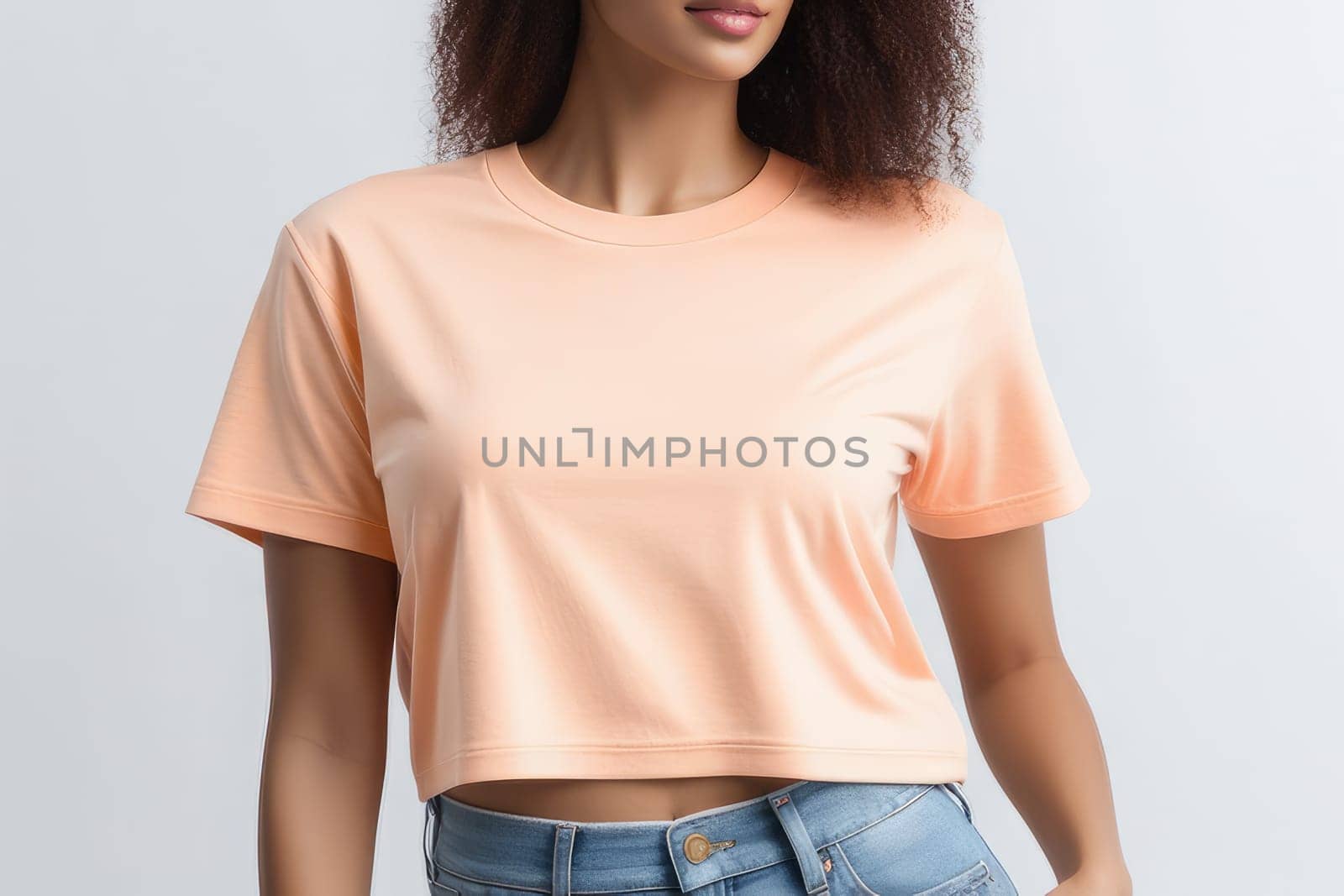 Woman in peach fuzz colored tshirt, can be used for design, mock up. The trending color of 2024