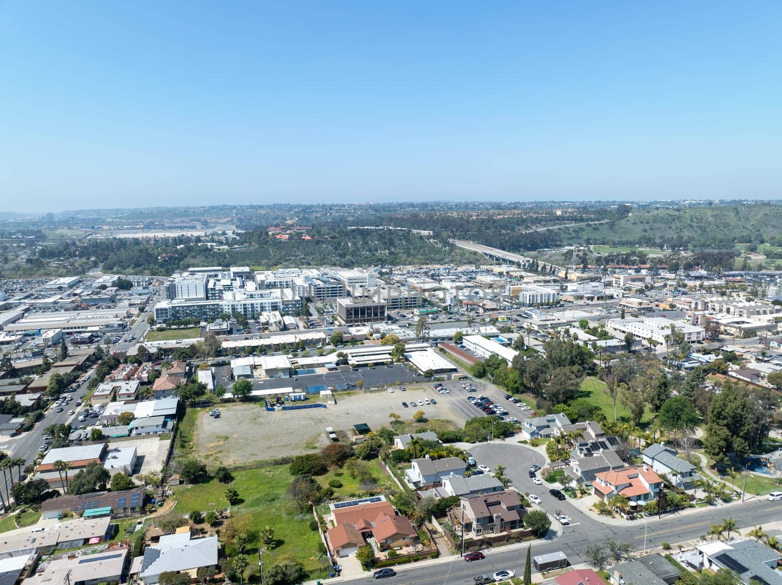 Aerial view of house with blue sky in suburb city in San Diego, California, USA.