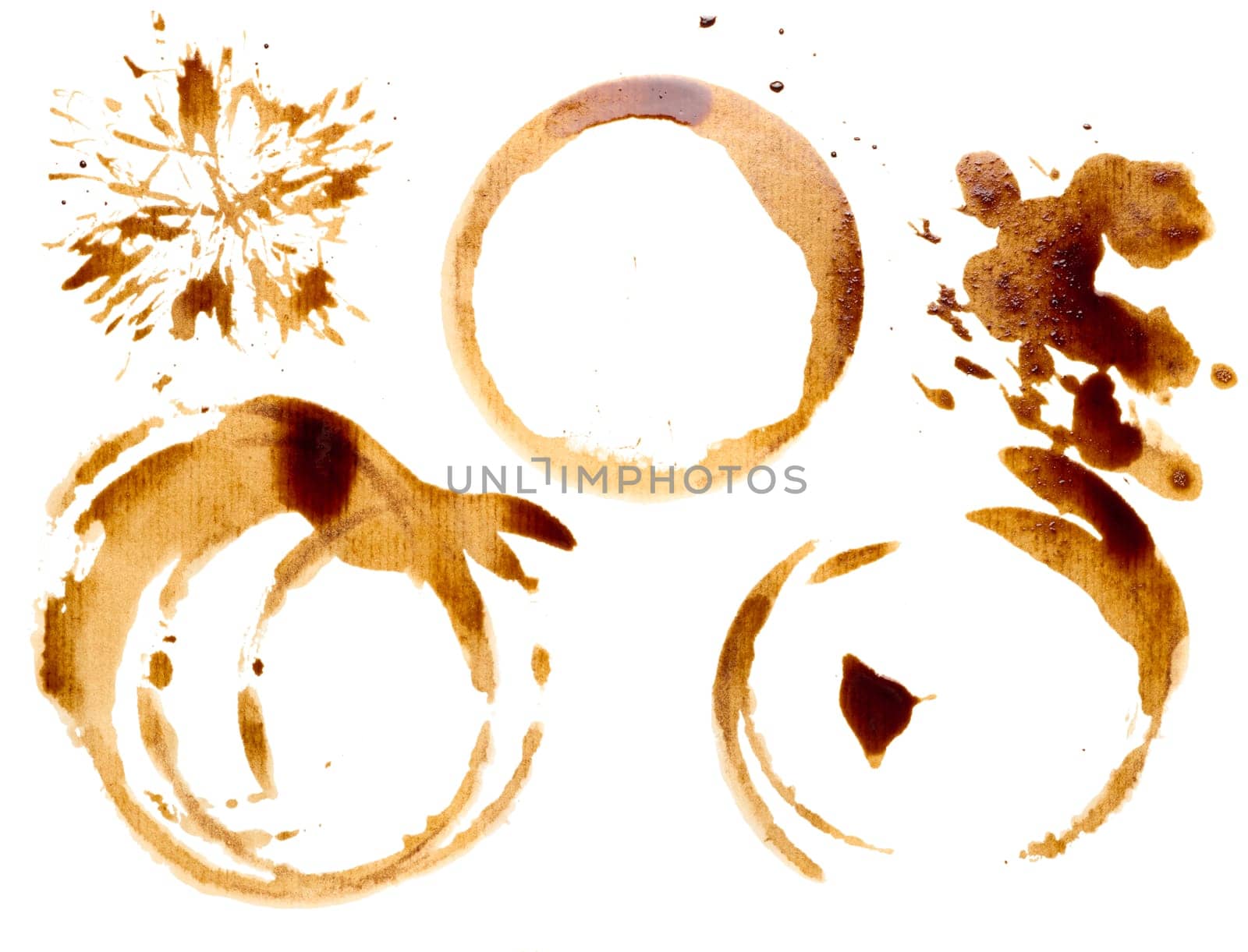 Spilled coffee with drops and splashes, round imprints from a cup  by ndanko