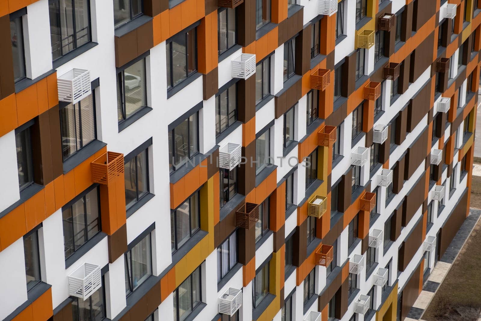 New apartment buildings with windows and balconies. Modern european complex by AnatoliiFoto