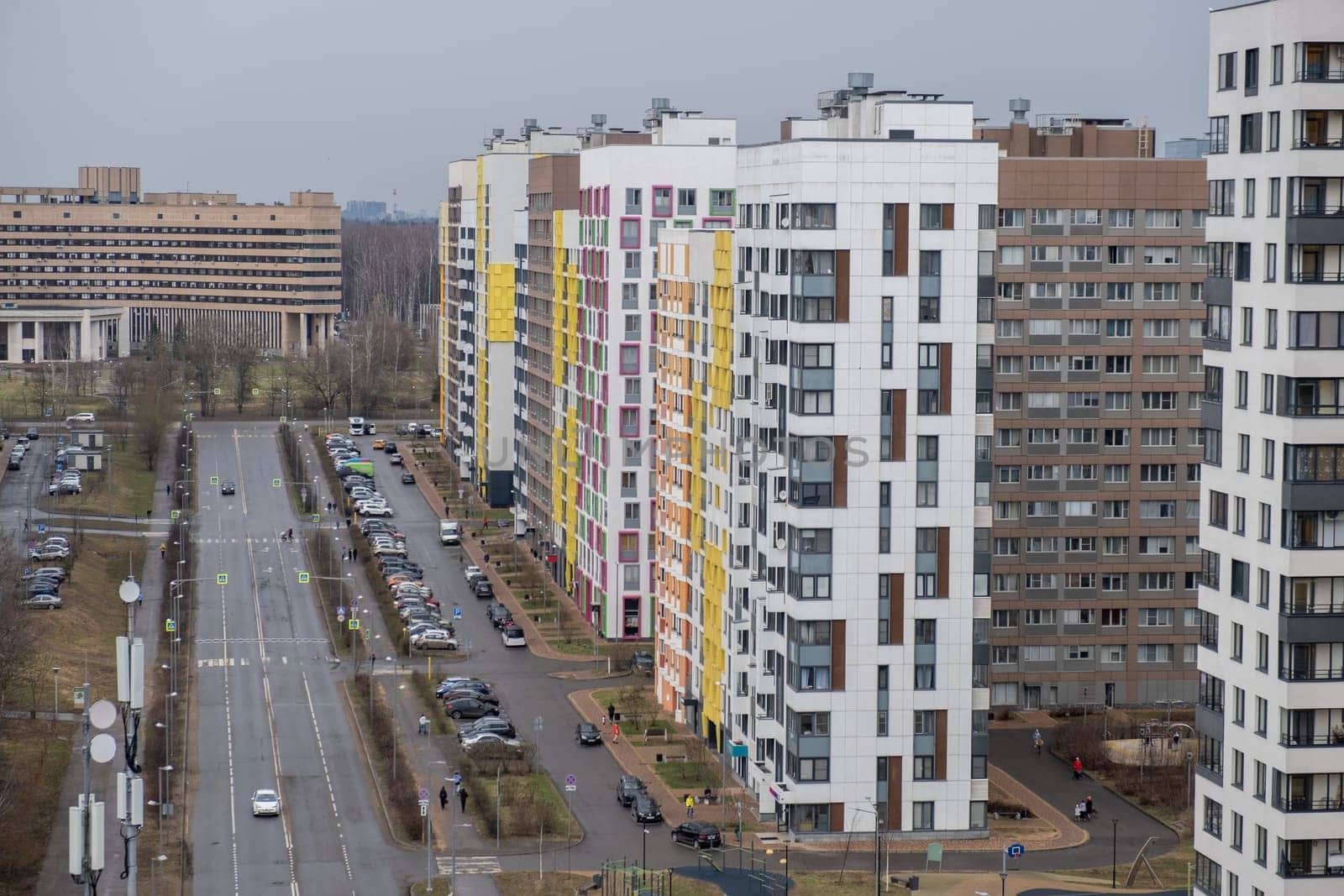 April 8, 2024, Moscow, Russia. New apartment buildings with windows and balconies. Modern european complex of apartment buildings. And outdoor facilities. Mixed media