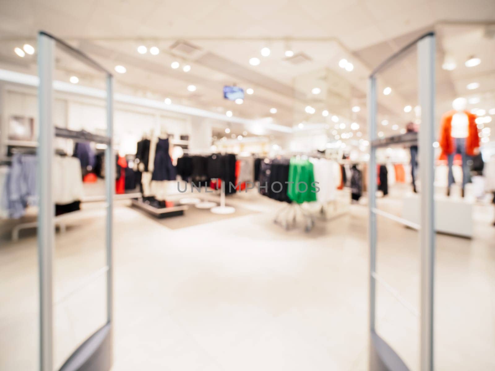 Blur entrance area of clothes shop by fascinadora