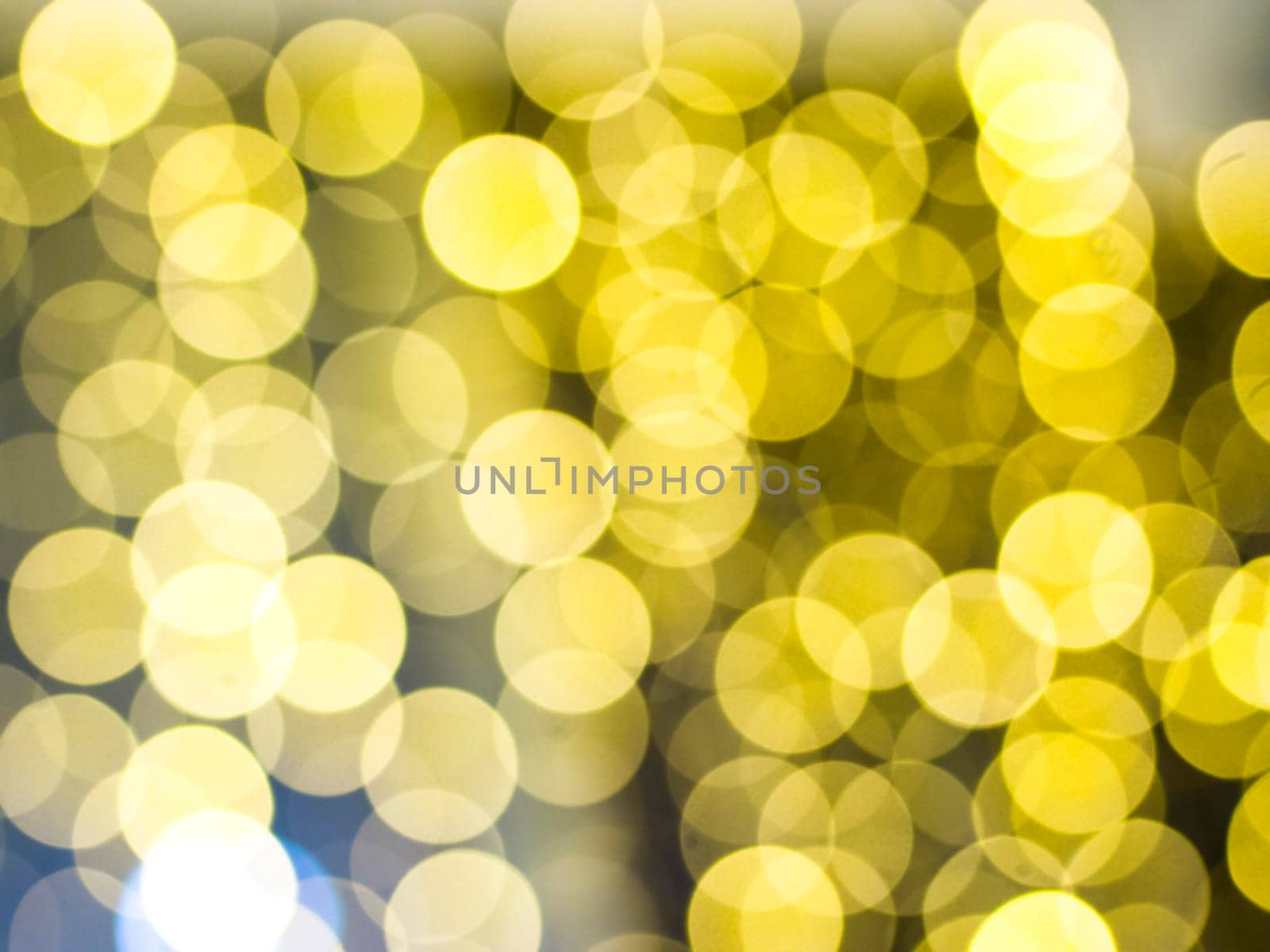gold abstract background with bokeh defocused lights. Soft blurred yellow and gold bokeh background, Abstract lights. Defocusing lens