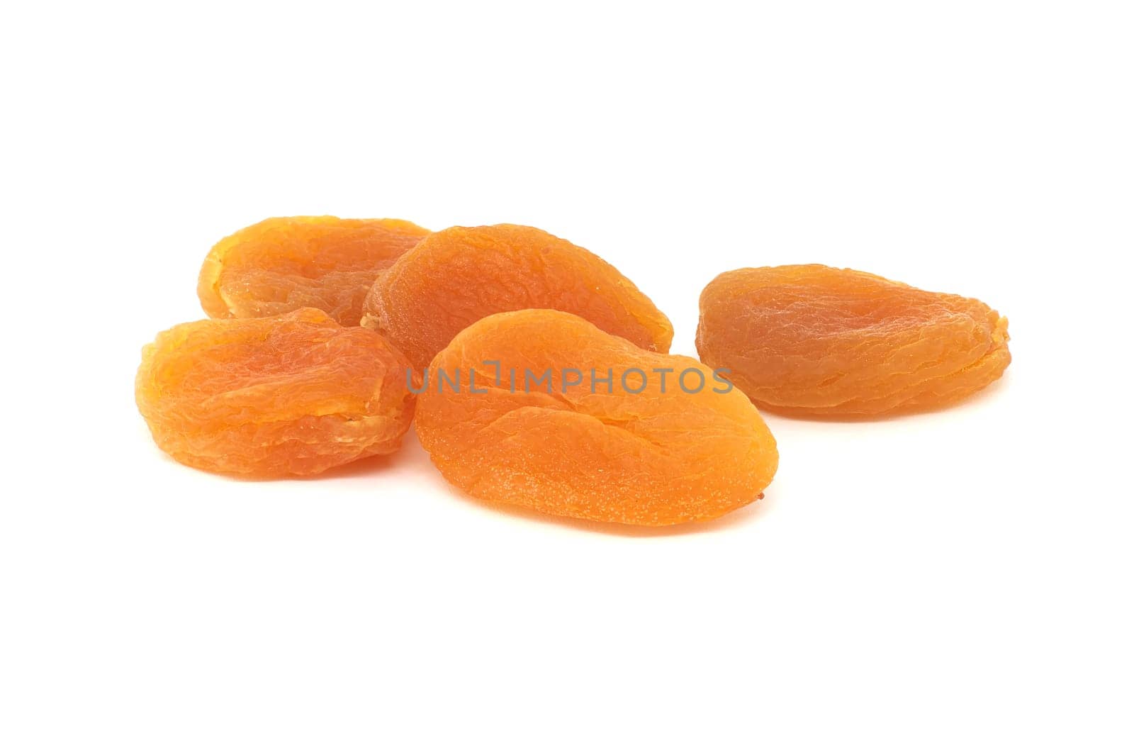 Dried apricots fruits isolated on white background by NetPix