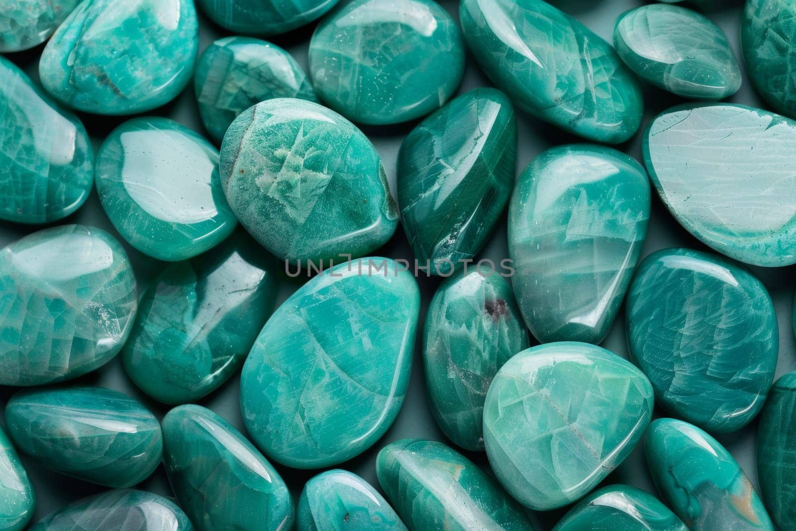Background with turquoise emerald-colored stones.