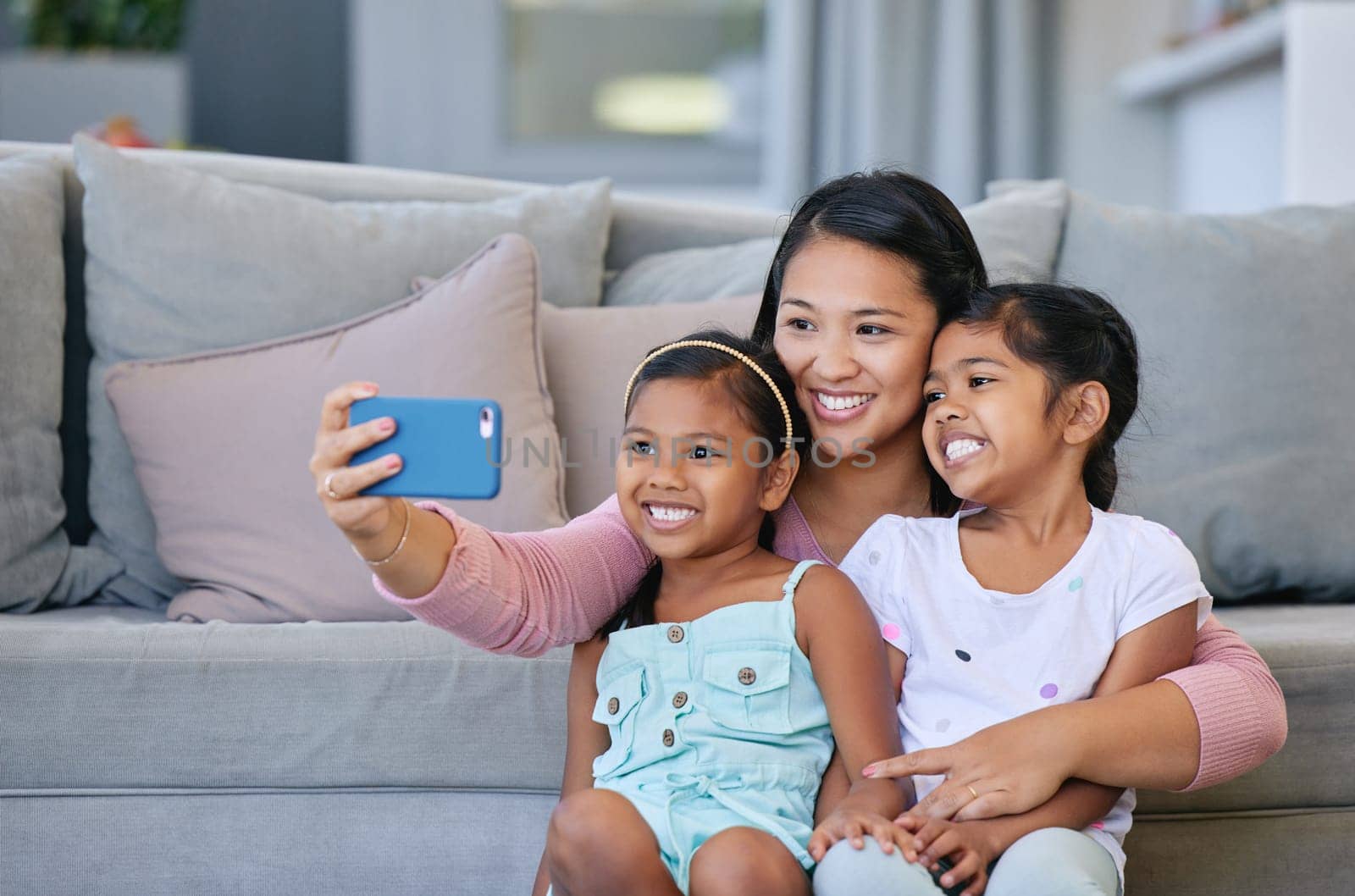 Mom, girl and happy with selfie for bonding or support, love and growth for child development. Parent, kid and satisfied at home with care, childhood memories and together with trust and smile.