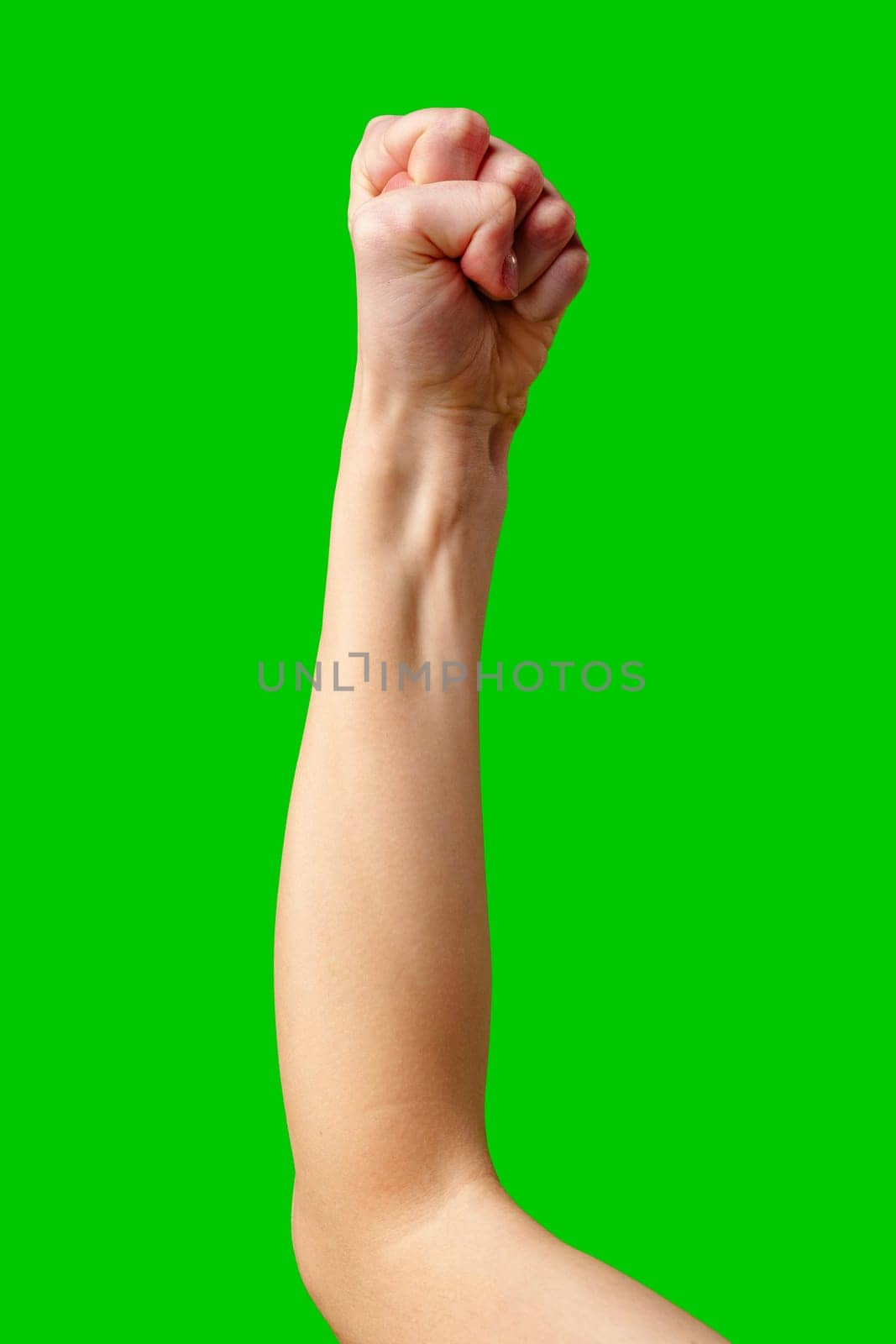 A womans arm is prominently displayed against a vibrant green screen background, providing a versatile canvas for digital editing and graphic design projects. The arm is positioned to showcase flexibility and movement, enhancing the visual appeal of the composition.