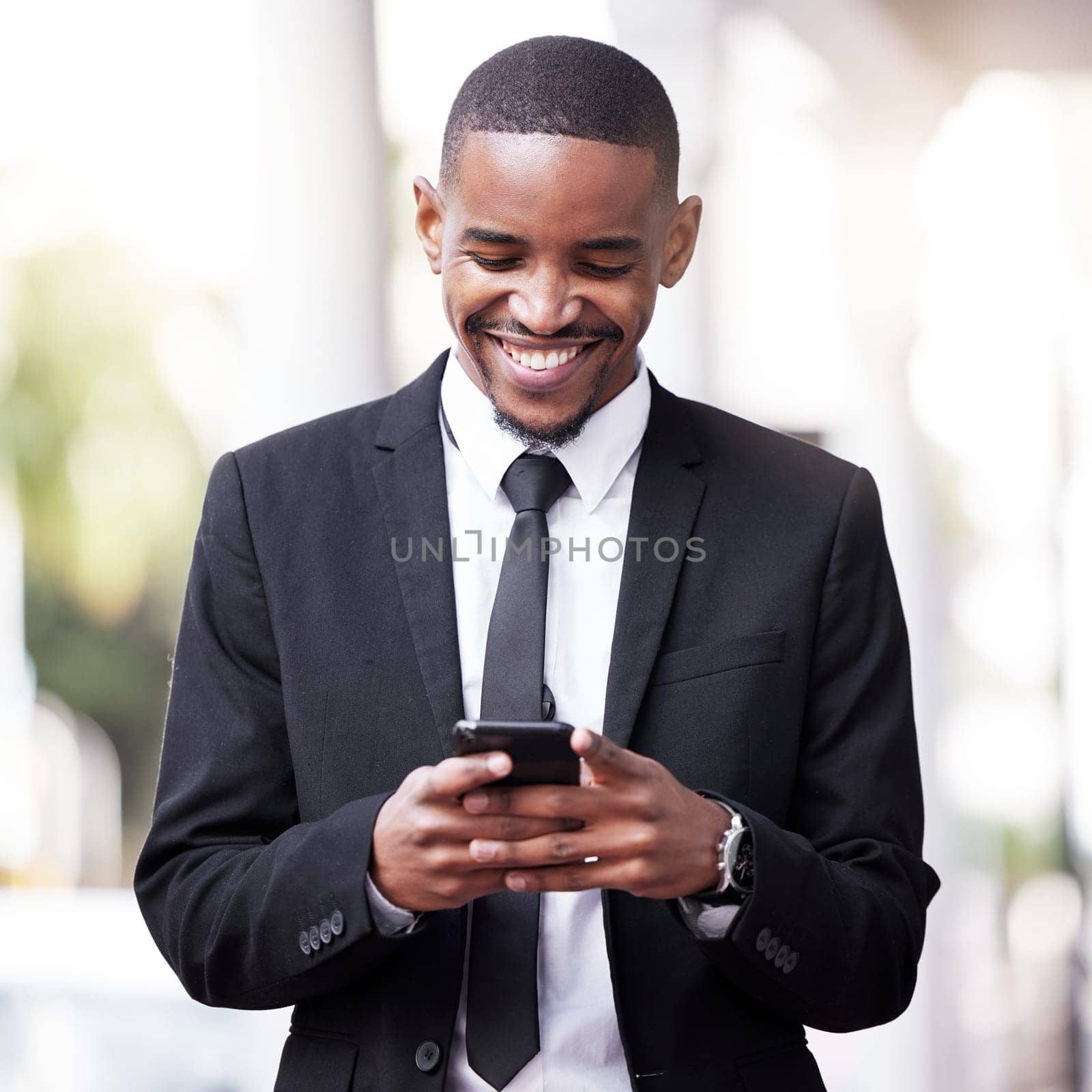 Professional, travel and black man with smartphone in city for ride share, online location or commute. Search, smile and lawyer on mobile for transport service, taxi or drive app in urban town by YuriArcurs