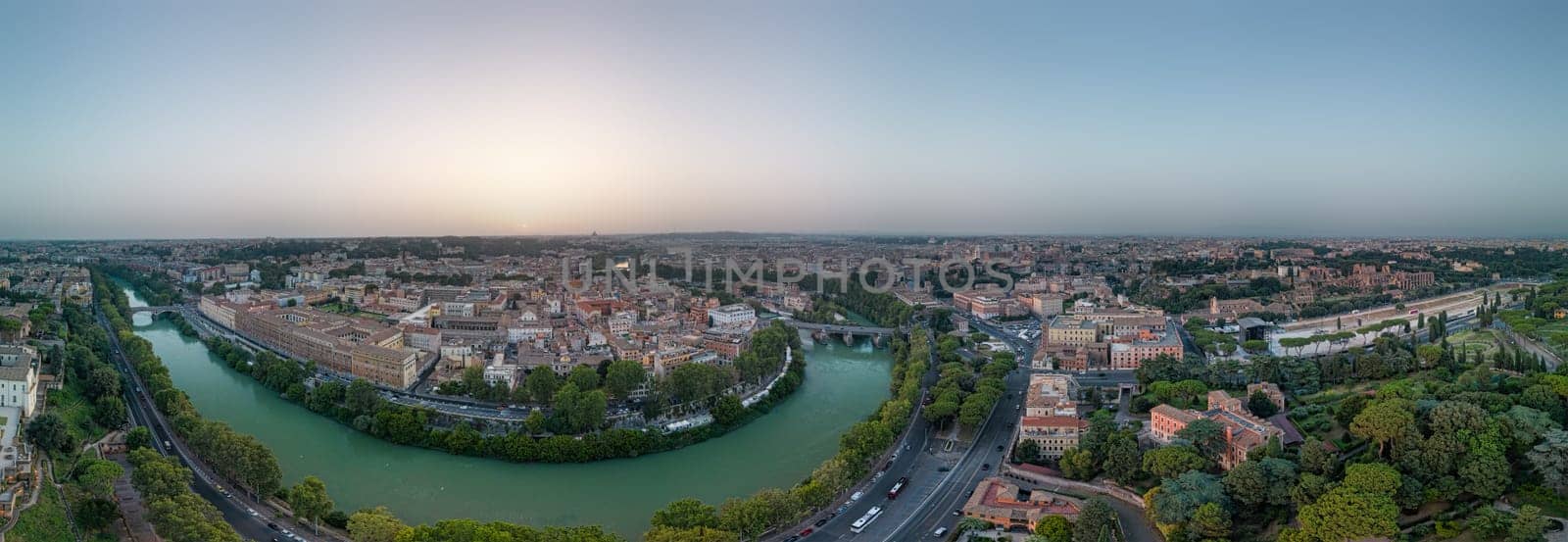 Rome and the Tiber in the evening at sunset. View from the Orange Garden