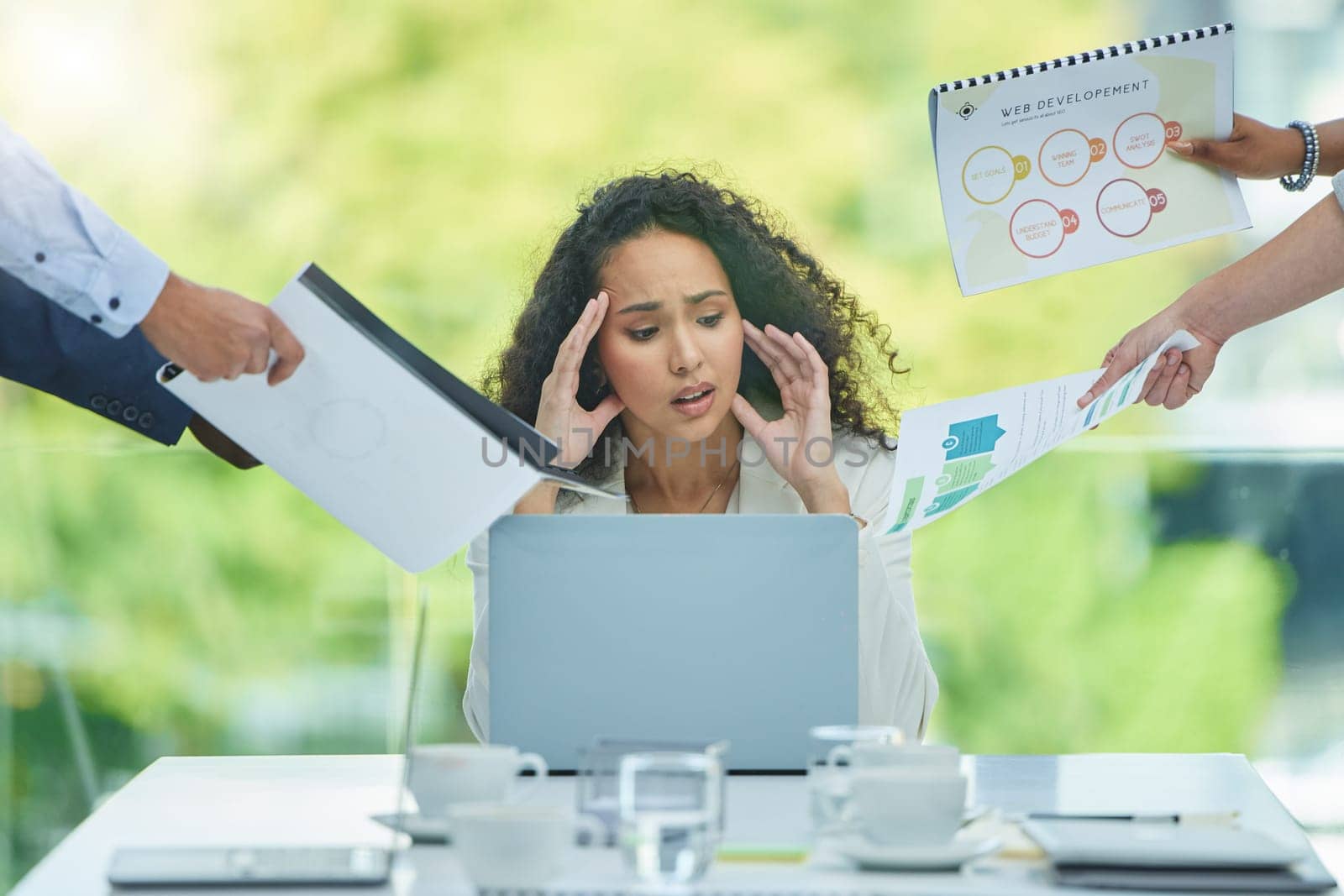Stress, chaos and business woman on laptop multitasking with documents, paperwork and team project. Corporate boss, burnout and person with headache, anxiety or frustrated in office for collaboration.