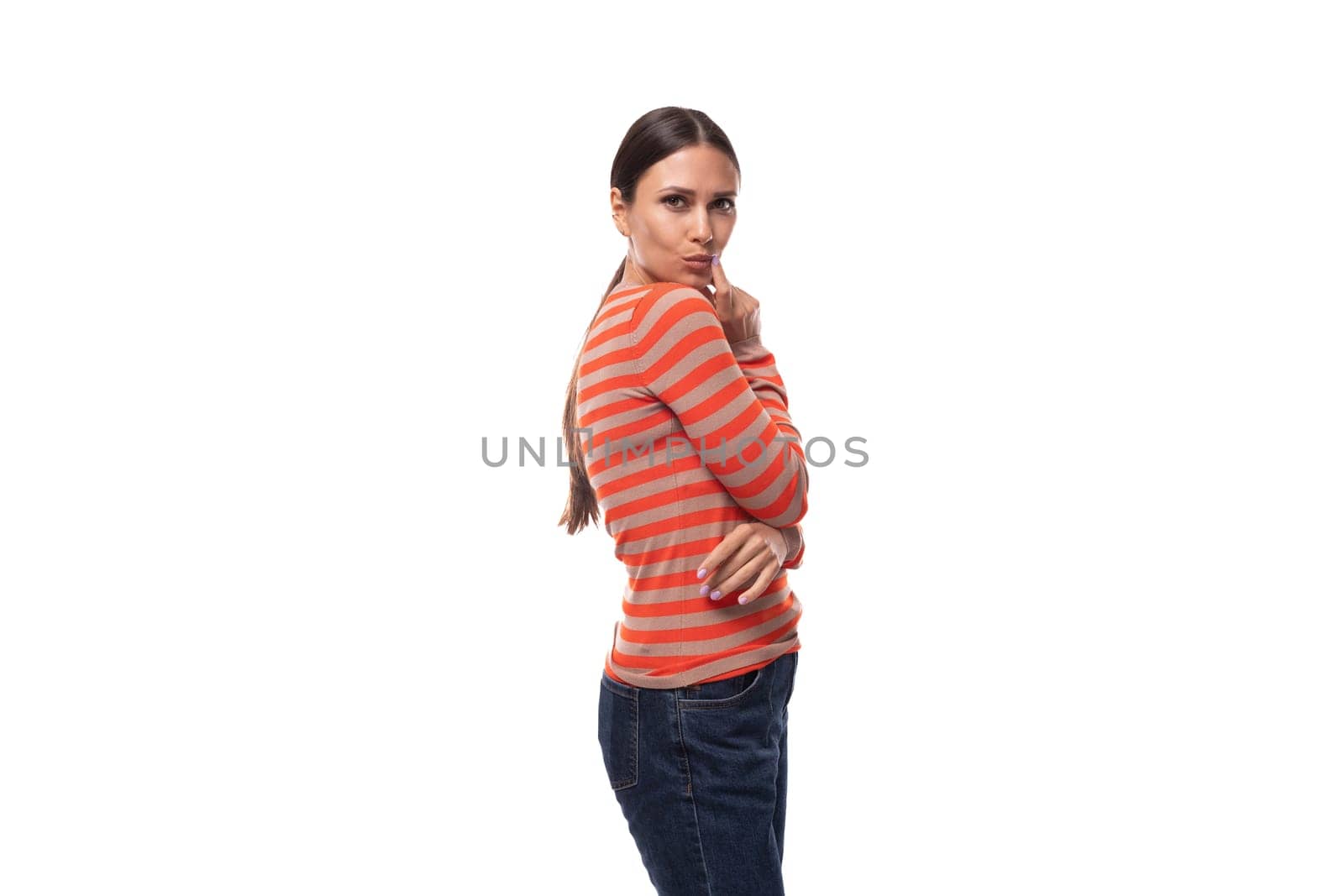 30 year old slim european woman dressed in a casual orange blouse isolated on white background with copy space.