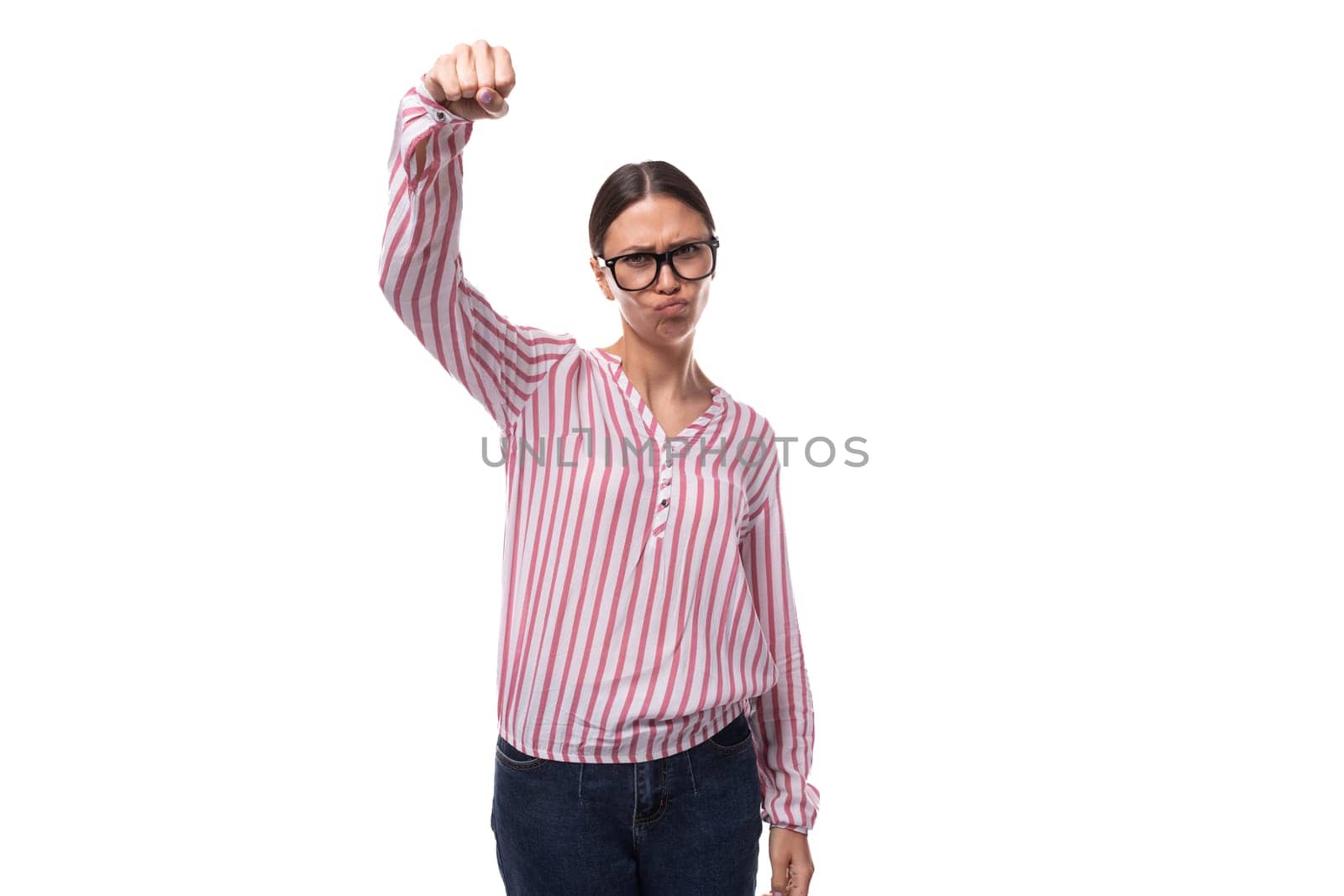 young positive secretary woman in glasses is dressed in a red-white blouse on a white background by TRMK