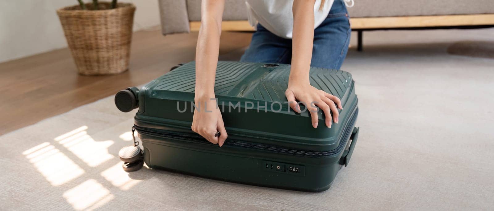 Woman and suitcase for travel summertime vacation packing clothing. relax and getaway preparation.
