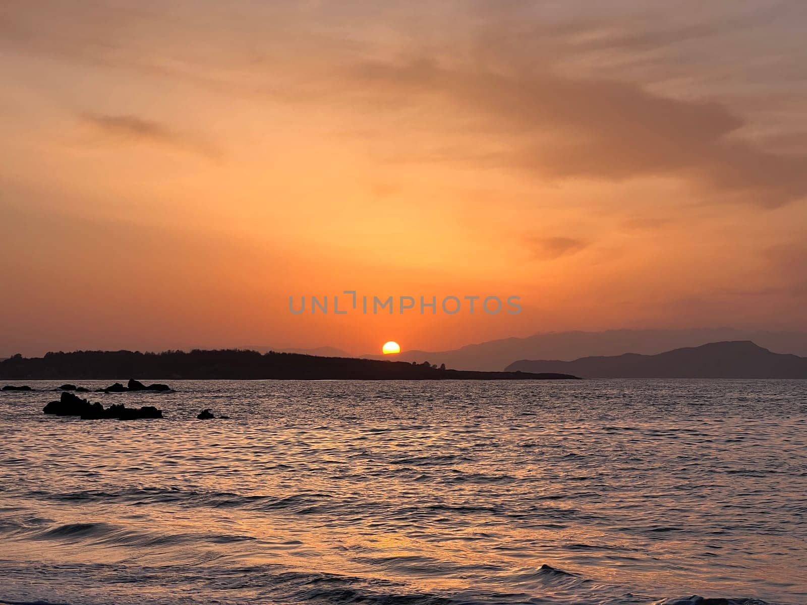 Golden hour sunrise in Chania Crete sun in see romantic by padgurskas