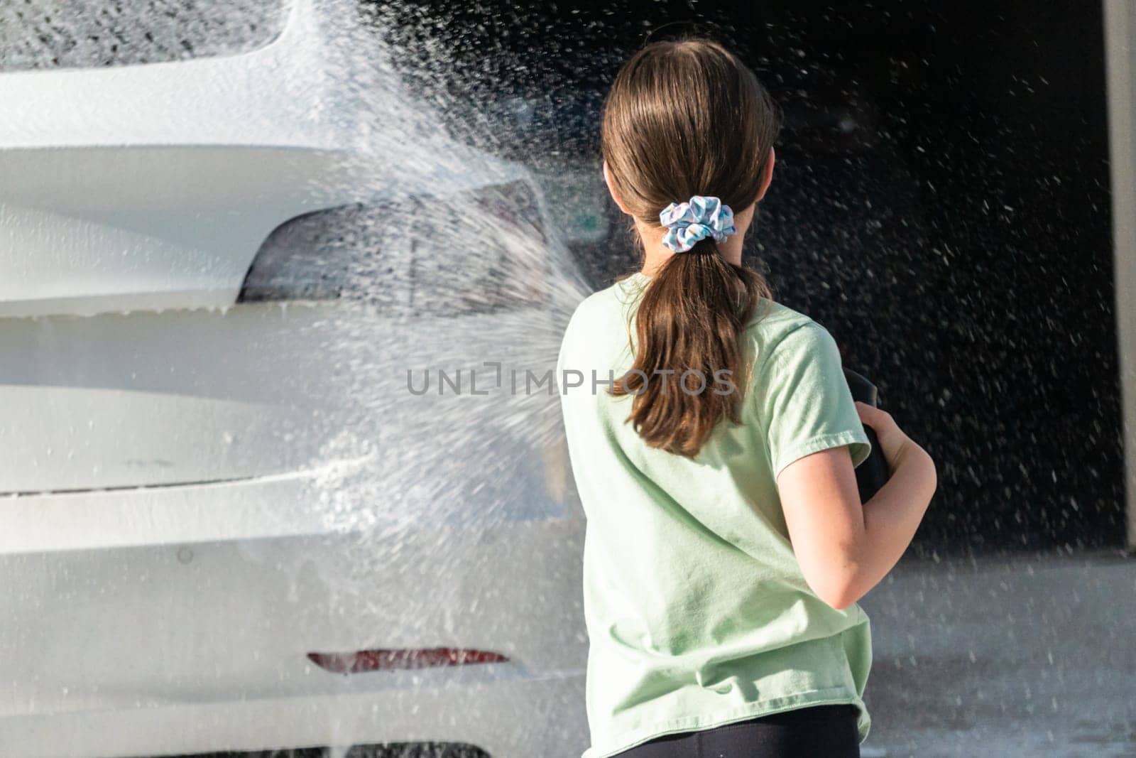 Little Helper Washing the Family Electric Car by arinahabich