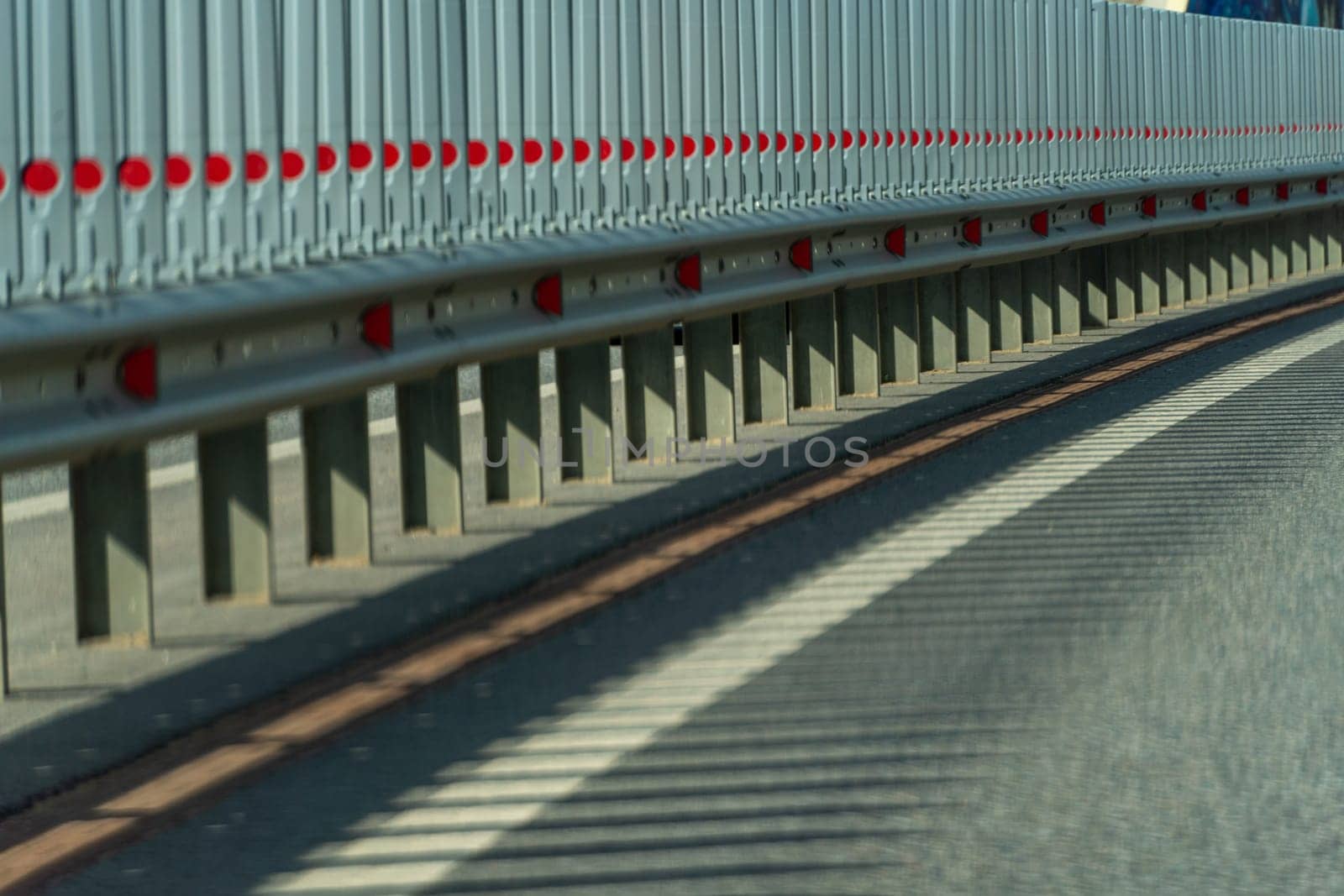 Safety barriers on highway. Anodized safety steel barrier. Enhancing highway safety. by Matiunina