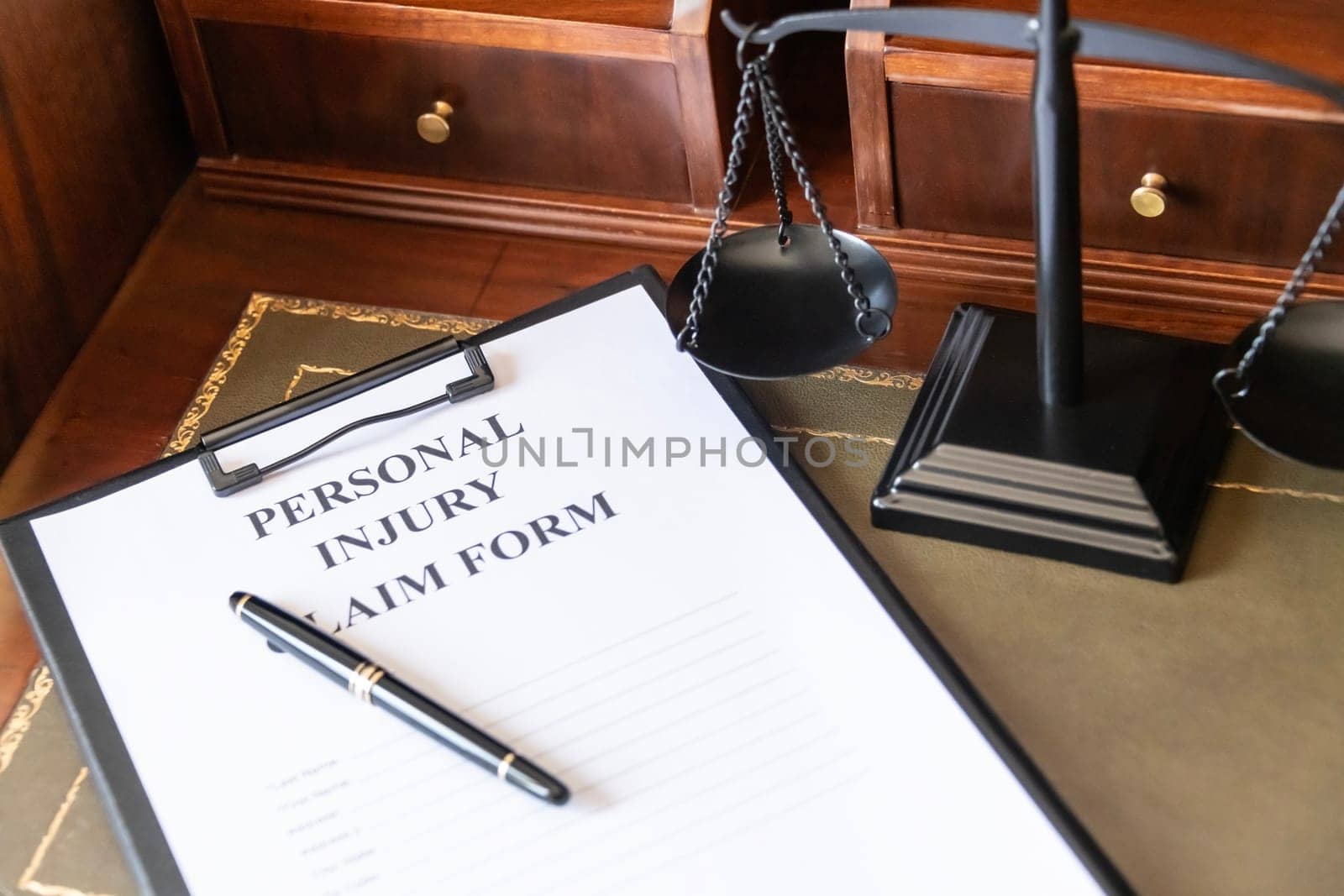 Personal Injury Claim Form on a Lawyer's Desk