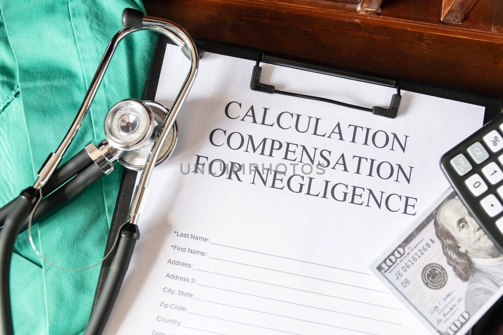 Document for calculating negligence compensation, with a stethoscope, money, and calculator on a medical uniform background