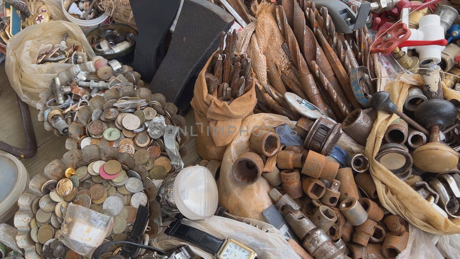 A flea market of old rusty things and tools