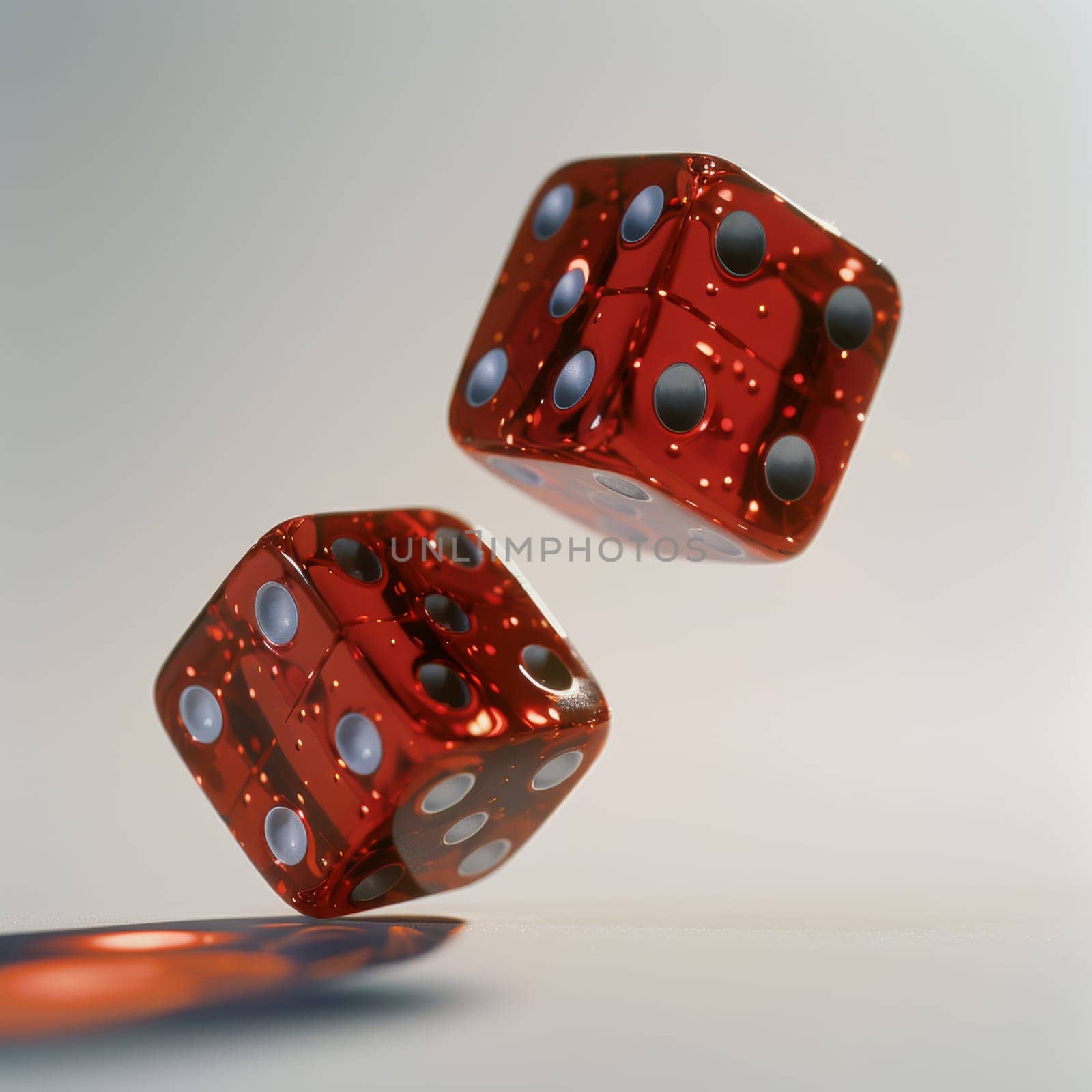 Two red dice are shown in midair, one on top of the other. Concept of excitement and anticipation, as if the dice are about to be rolled in a game of chance