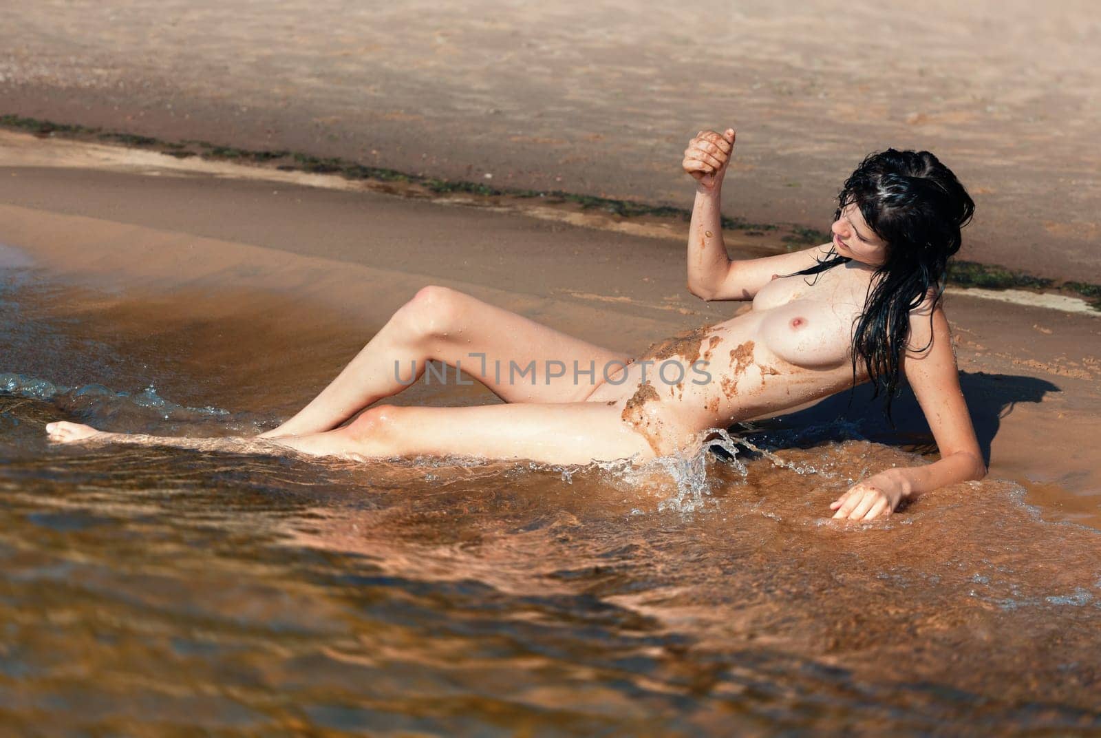 Young Beautiful Woman Posing Nude At The Seaside