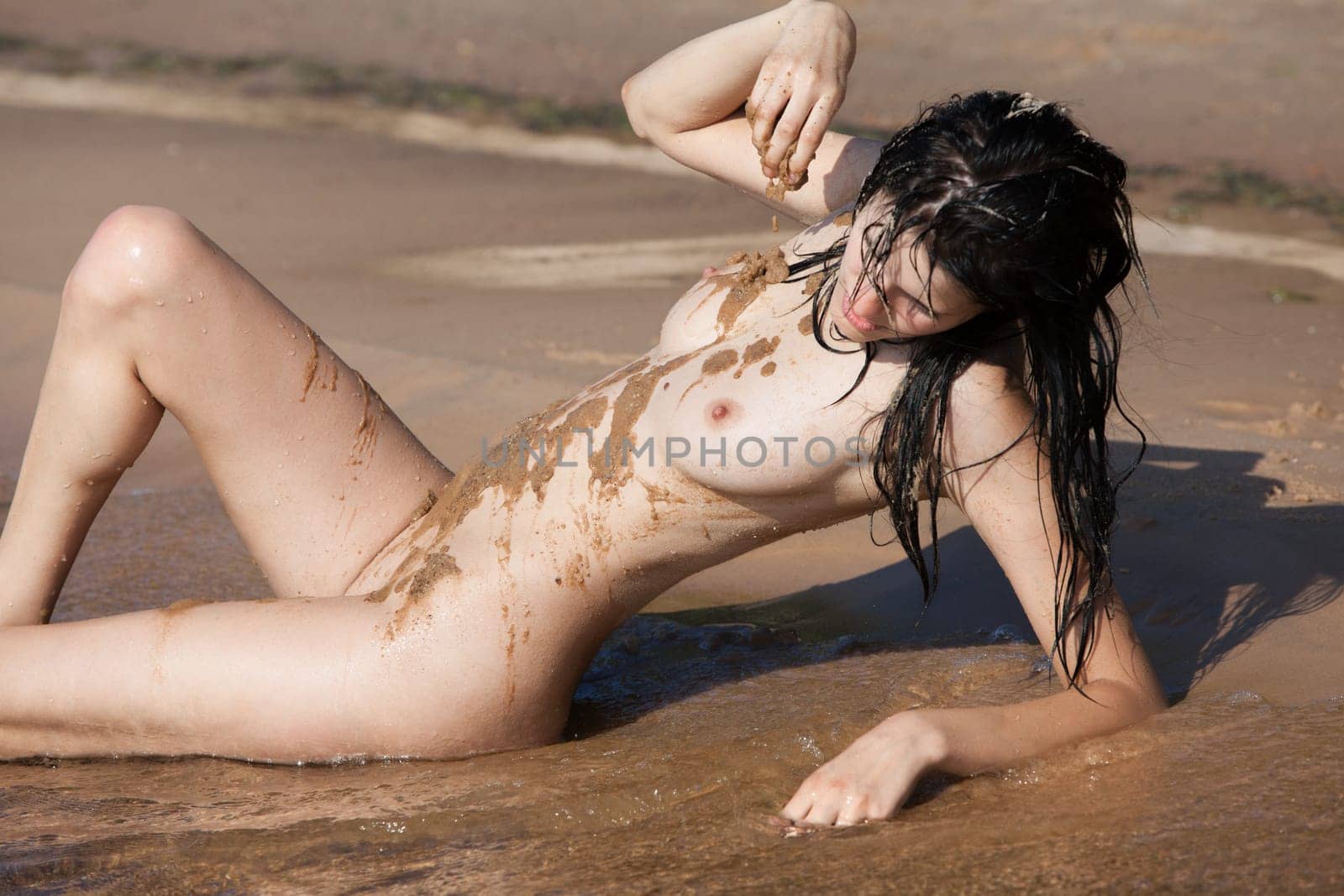 Young Beautiful Woman Posing Nude At The Seaside