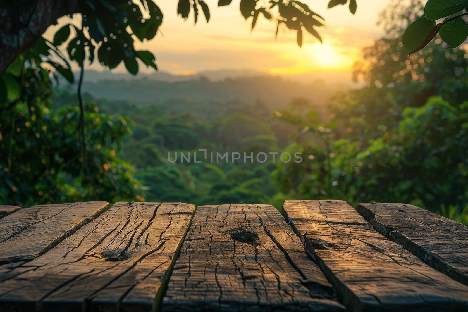 A wooden table with a view of the mountains and a sunset in the background. The table is empty and the view is serene and peaceful