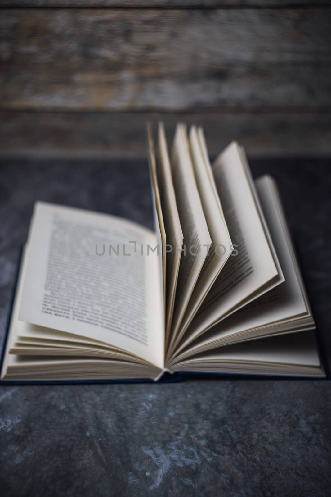 Open book on a marble background. High quality photo