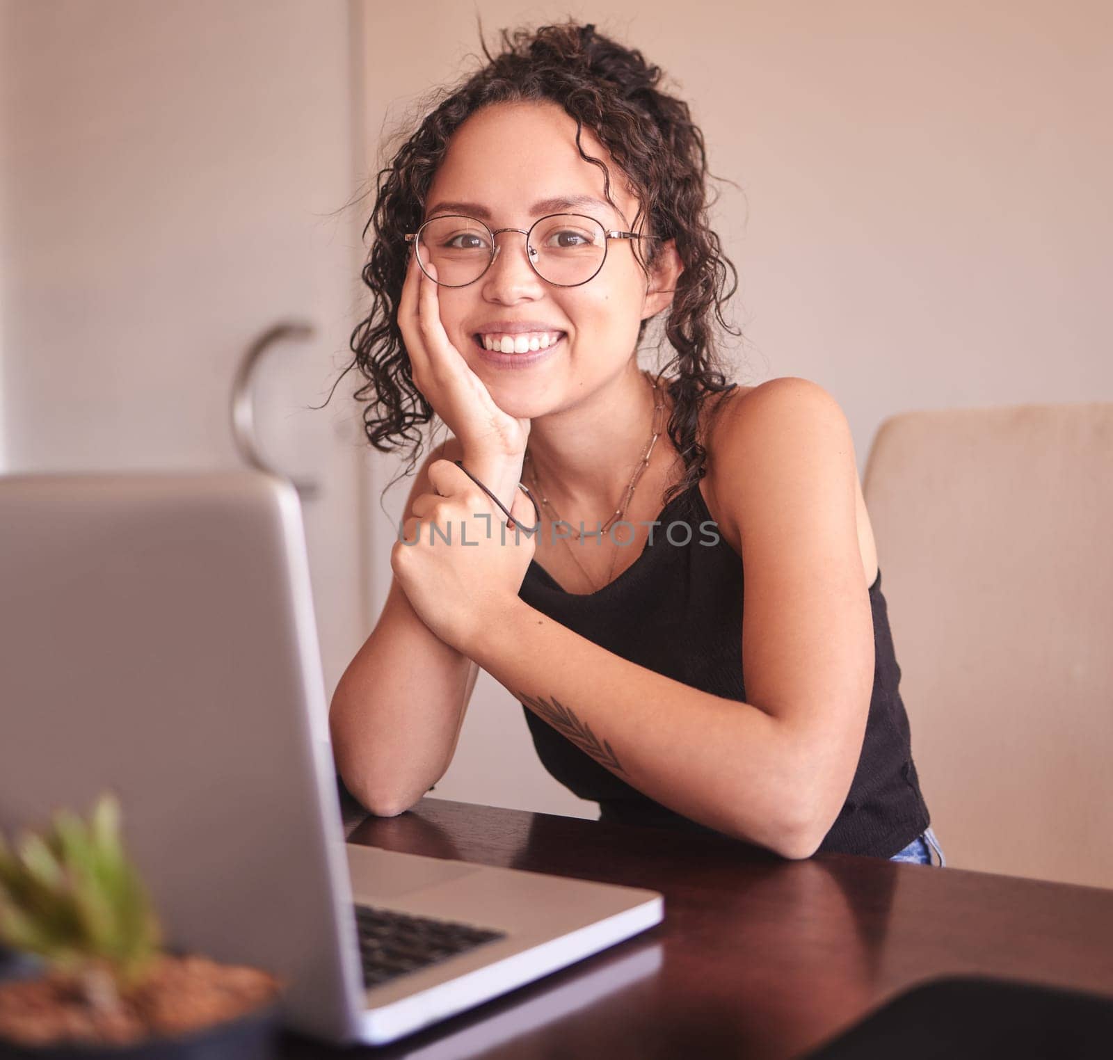 Laptop, smile and woman in portrait in home for planning, website and remote worker. Blog, networking and social media with female person or freelancer for email, technology and working in California.
