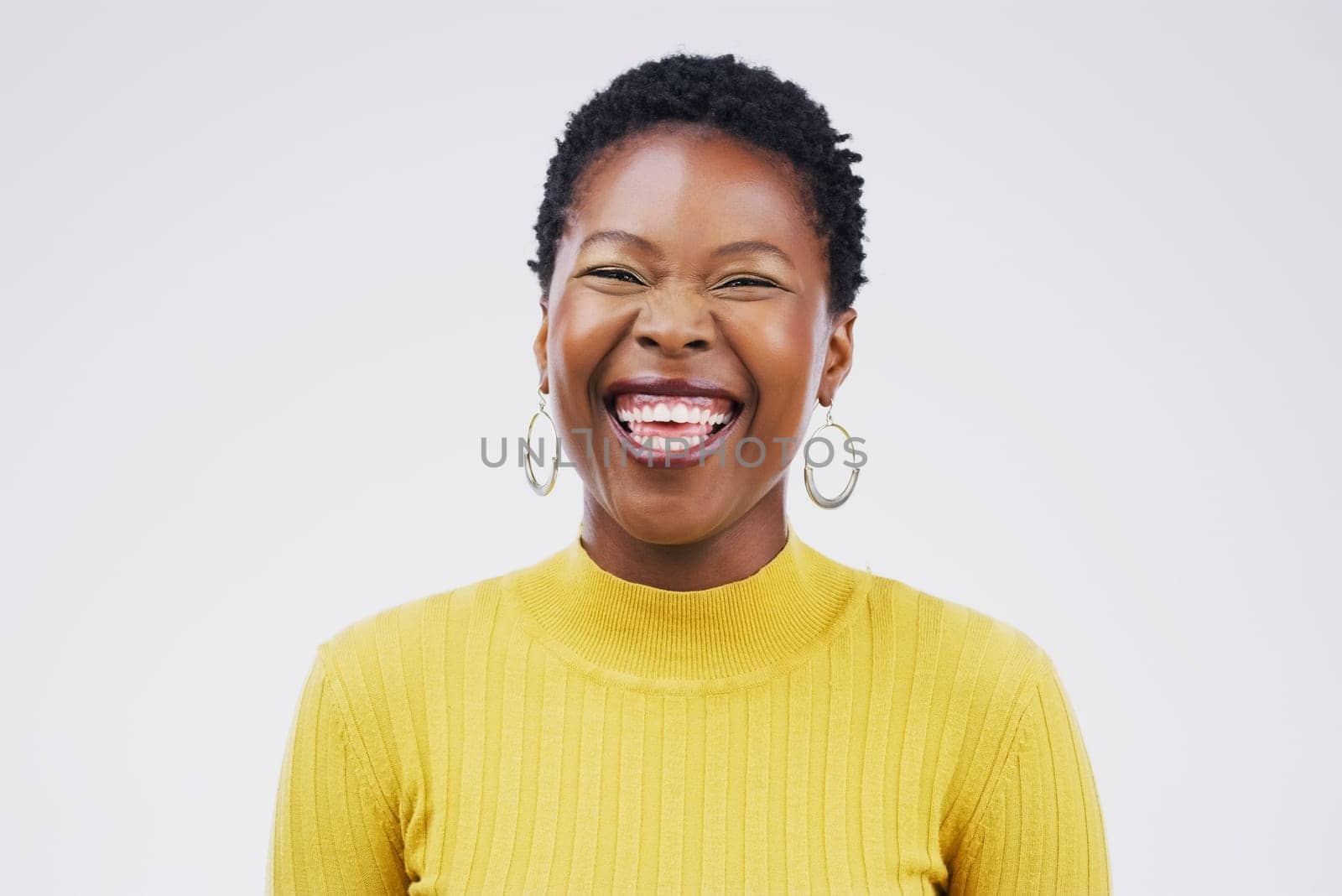 Studio, portrait and laugh for black woman, funny and confidence on white background. Face, joke and comedy for happy female student, cheerful and meme for humor and smile for silly or goofy comic.