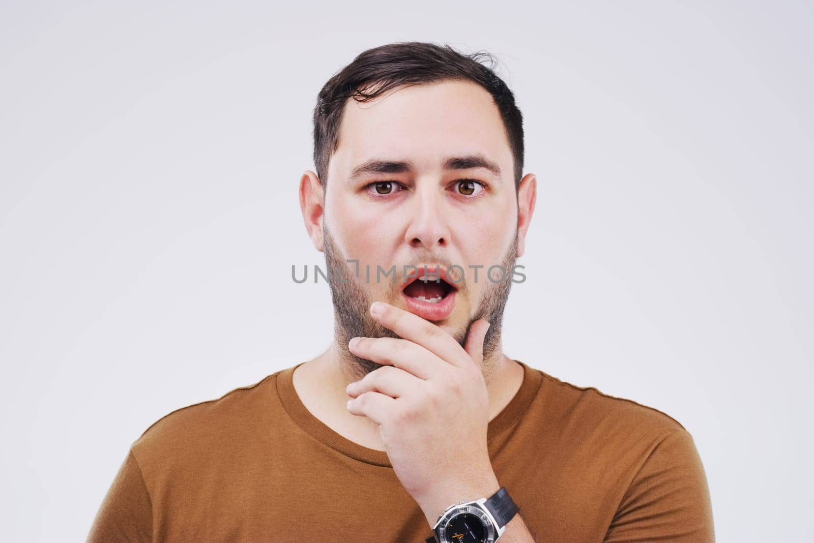 Portrait, man and surprise in studio white background with body language for choice, thinking or confused. Male person, wonder or shock face with news for announcement, save the date and wow or omg by YuriArcurs