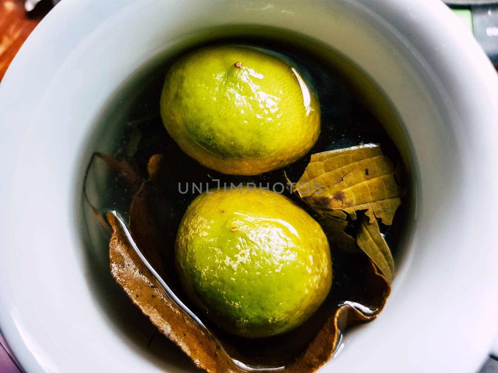 Homemade hot drink with honey, lemon and matico to remedy the cold. by Peruphotoart