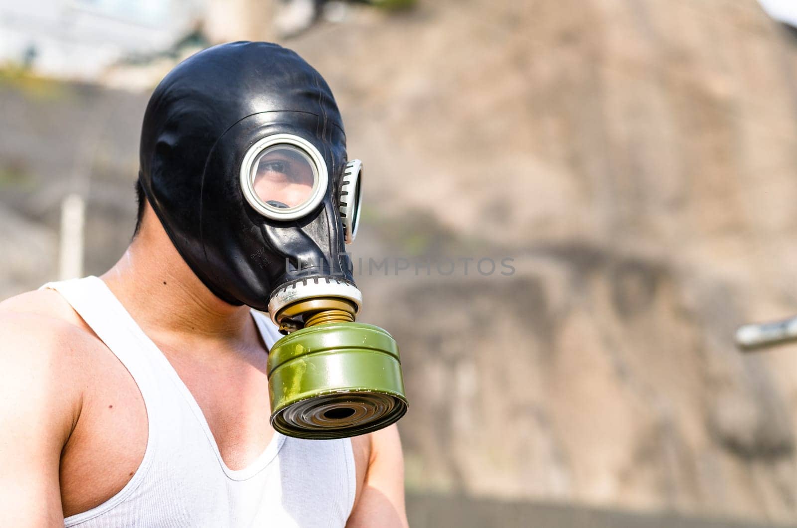 A muscular man in a gas mask. by Peruphotoart