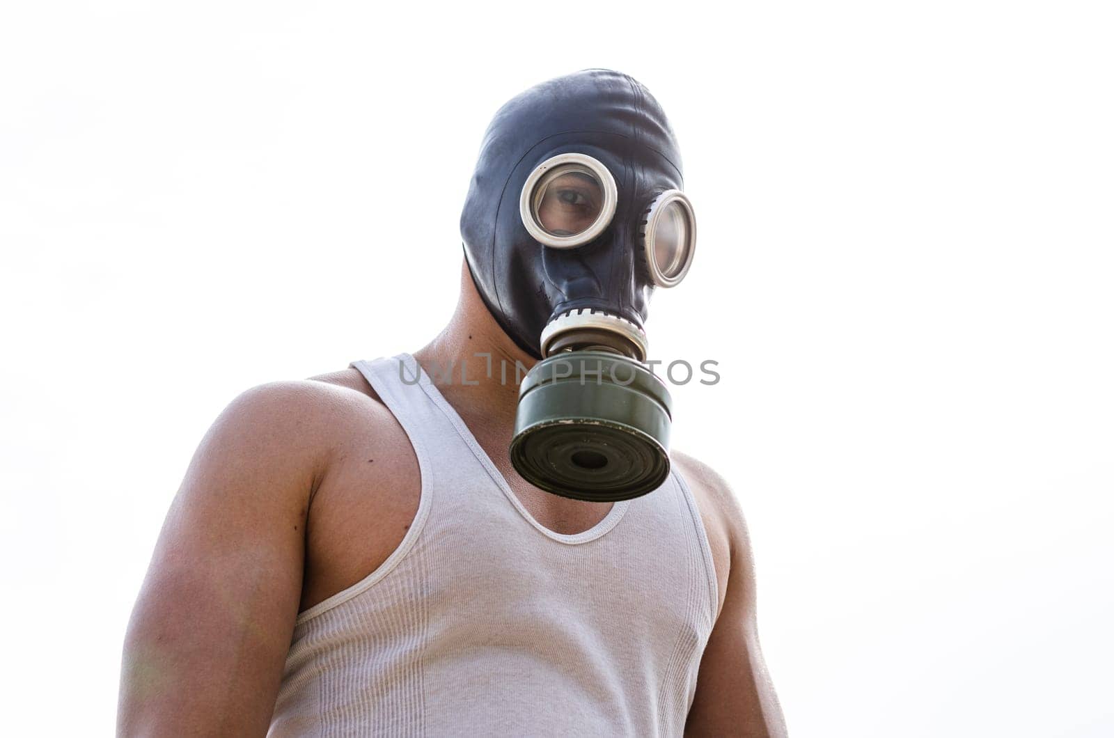A muscular man in a gas mask. by Peruphotoart