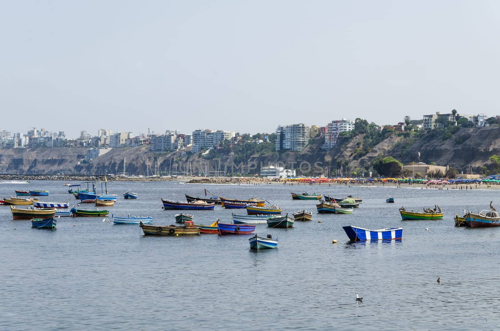 Beautiful boats in the beach Pescadores en Chorrillos , Lima- Peru