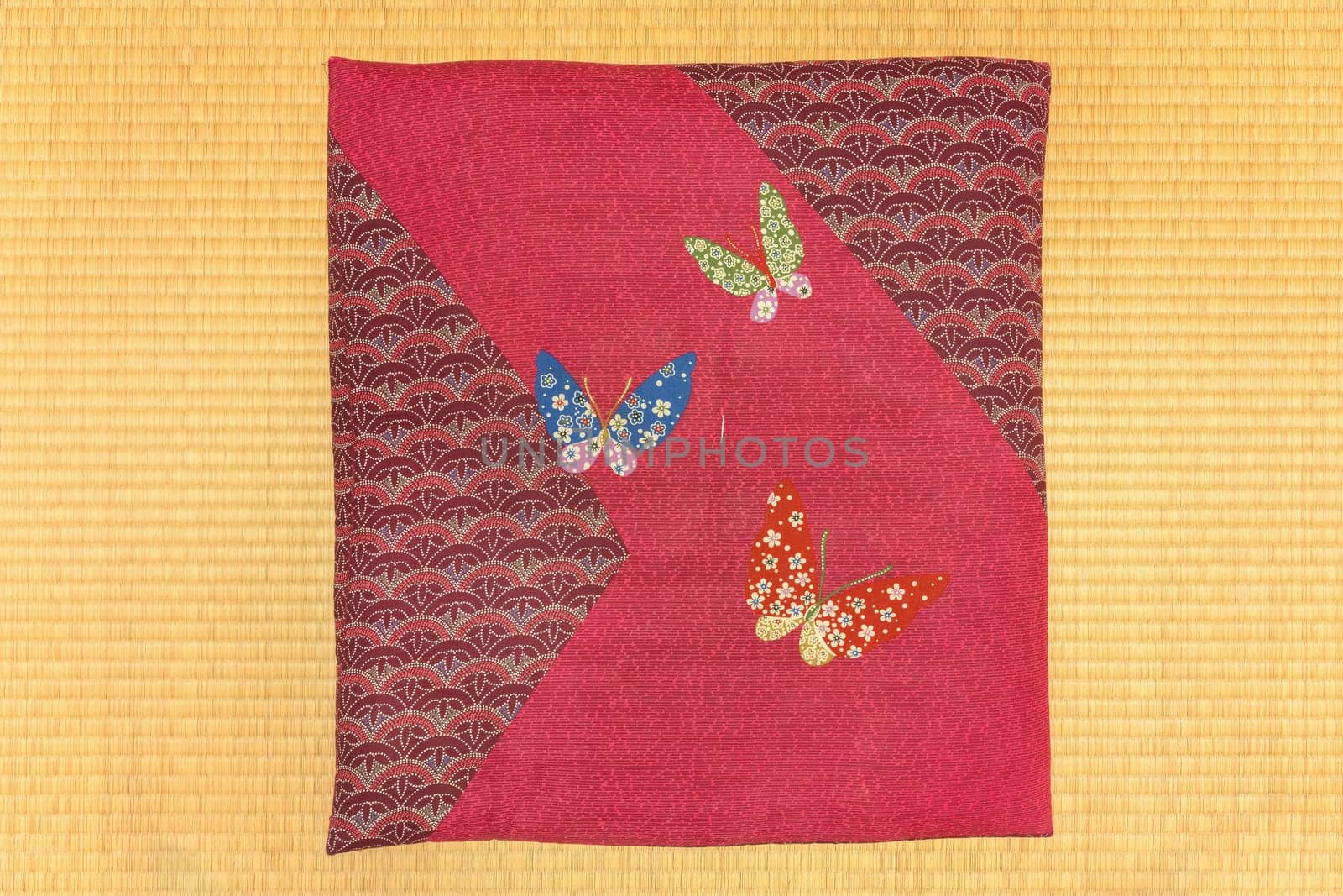 Japanese zabuton cushion with embroidered butterflies on a rice straw tatami. by kuremo
