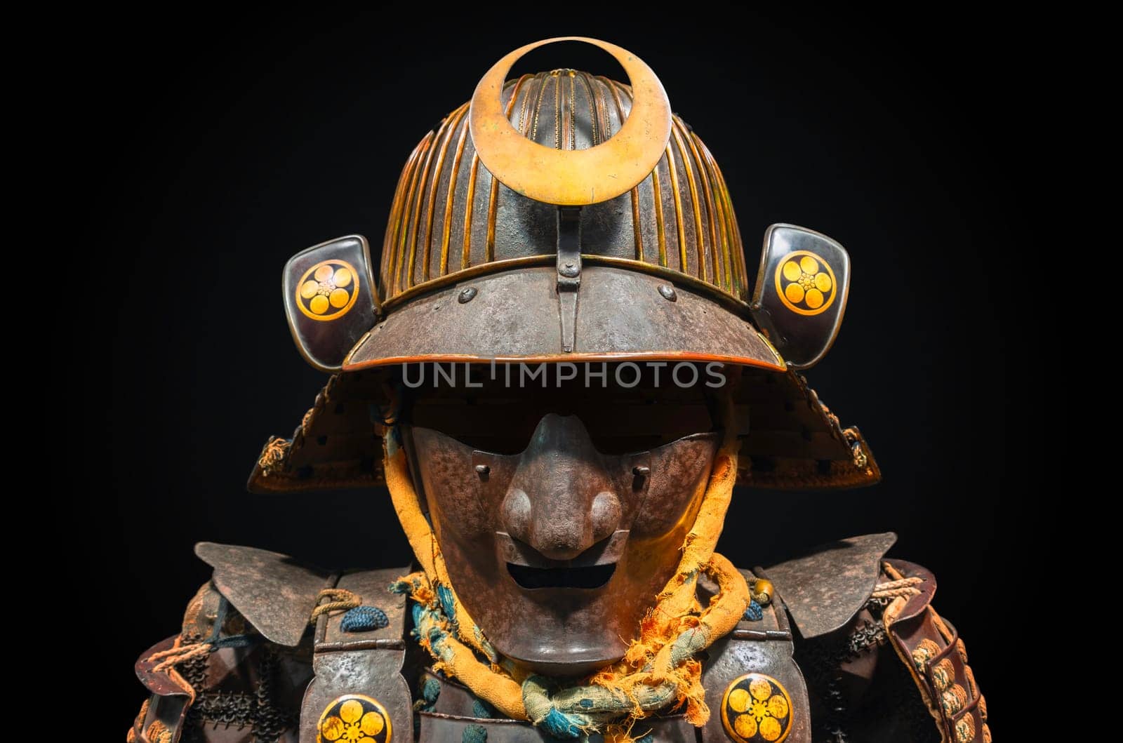 Japanese Kabuto helmet featuring facial armor safeguarding face embellished with golden maru-ni-umebachi plum crests paired with a haramaki-style armor laced with threads.