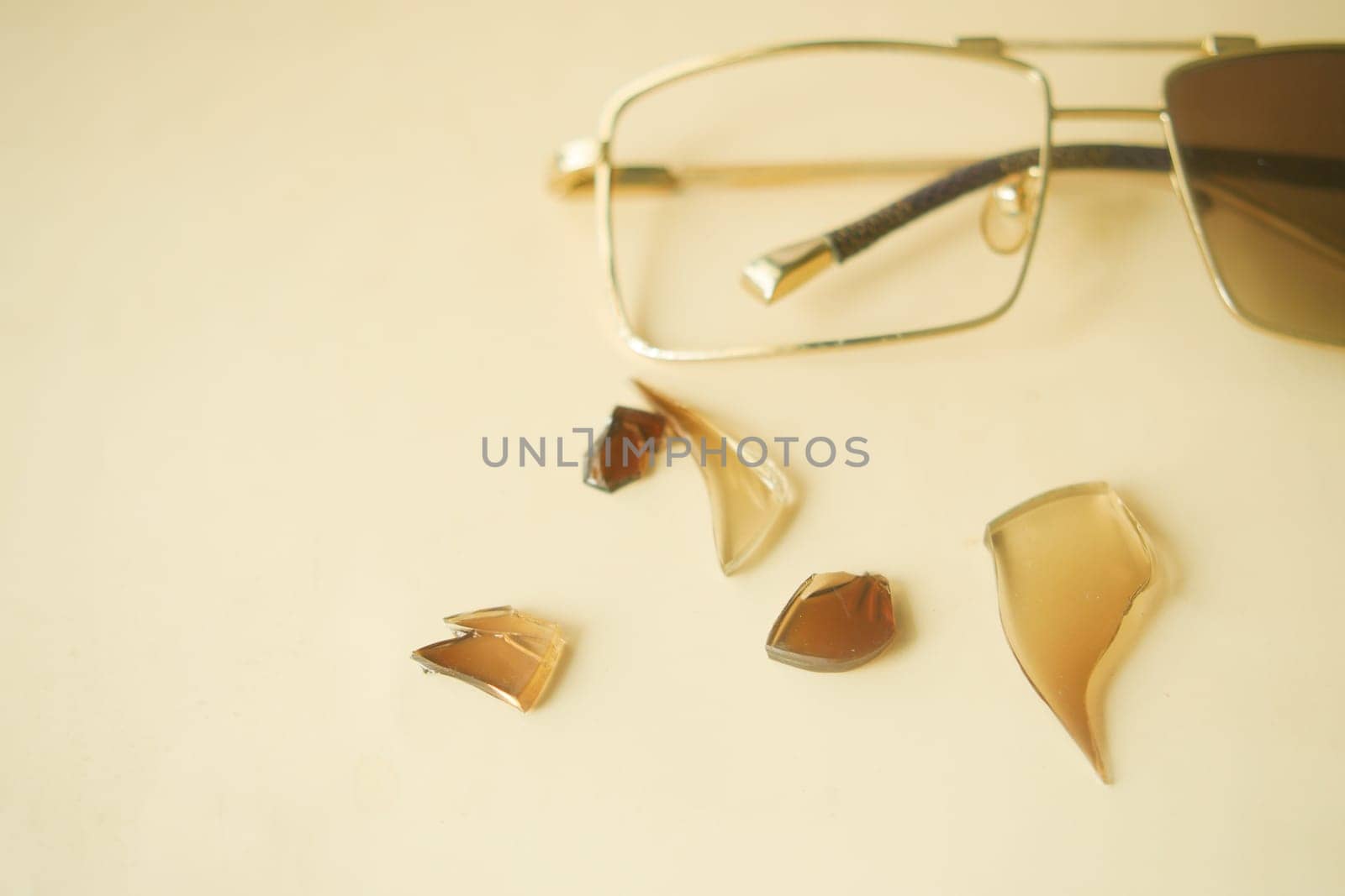 broken eye glass on table with copy space by towfiq007
