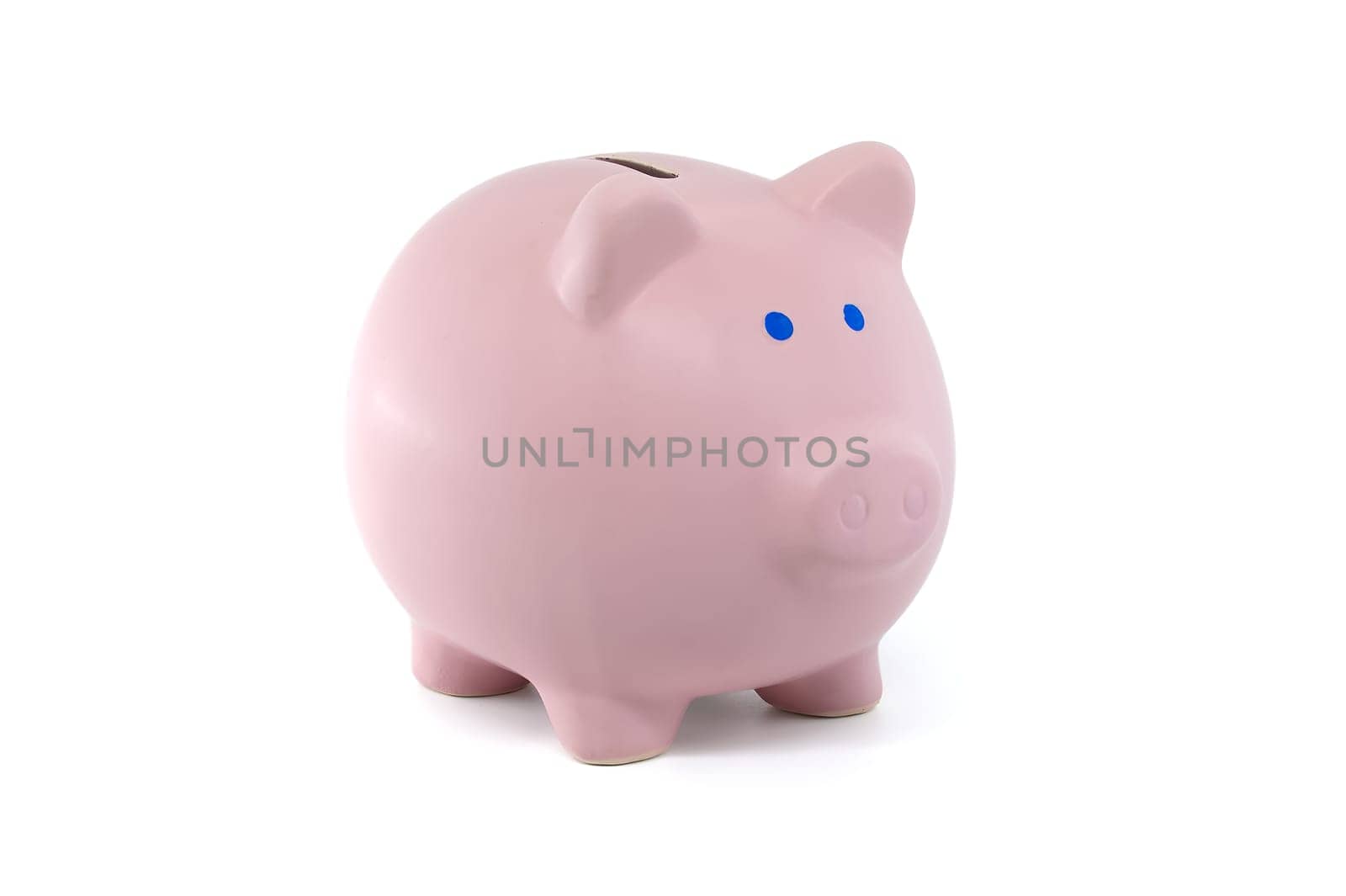 Piggy bank, which has blue eyes and a pink nose isolated on a white background