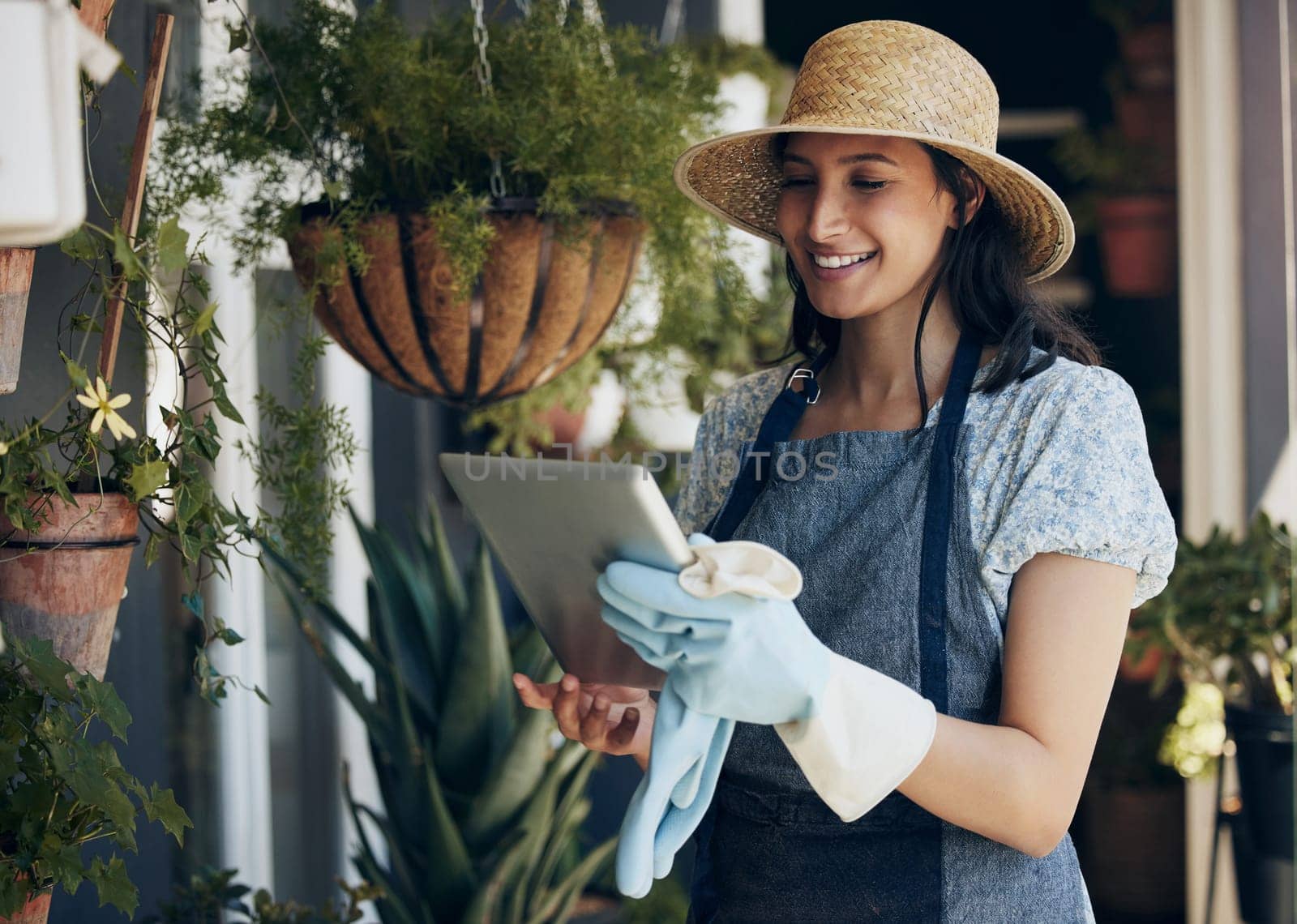 Florist, tablet or woman in nature for flowers for growth, ecology development or agriculture business. Gardener, nursery and girl farming for plants, horticulture research and floral results online.